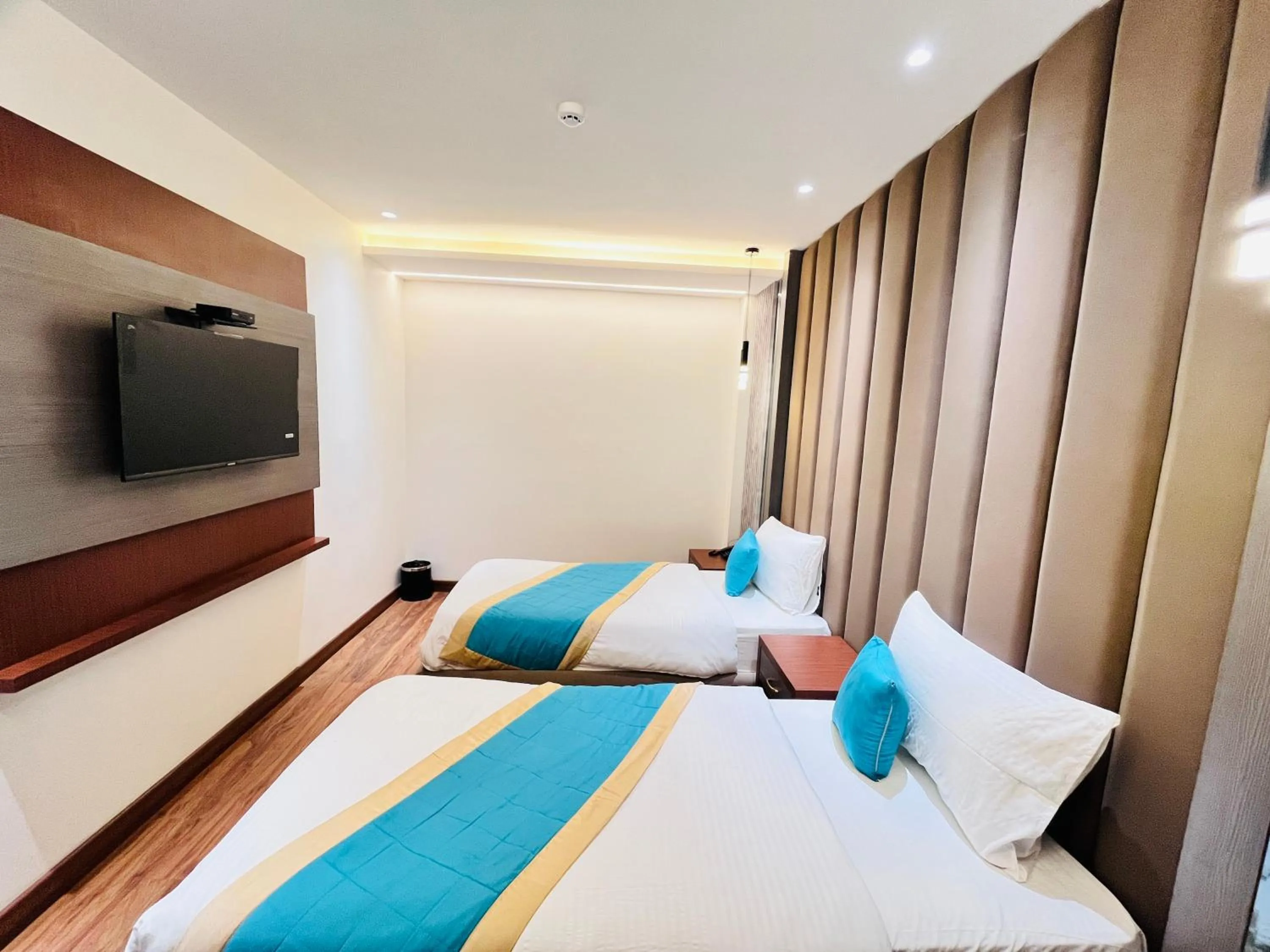 Bed in Western Blu INN