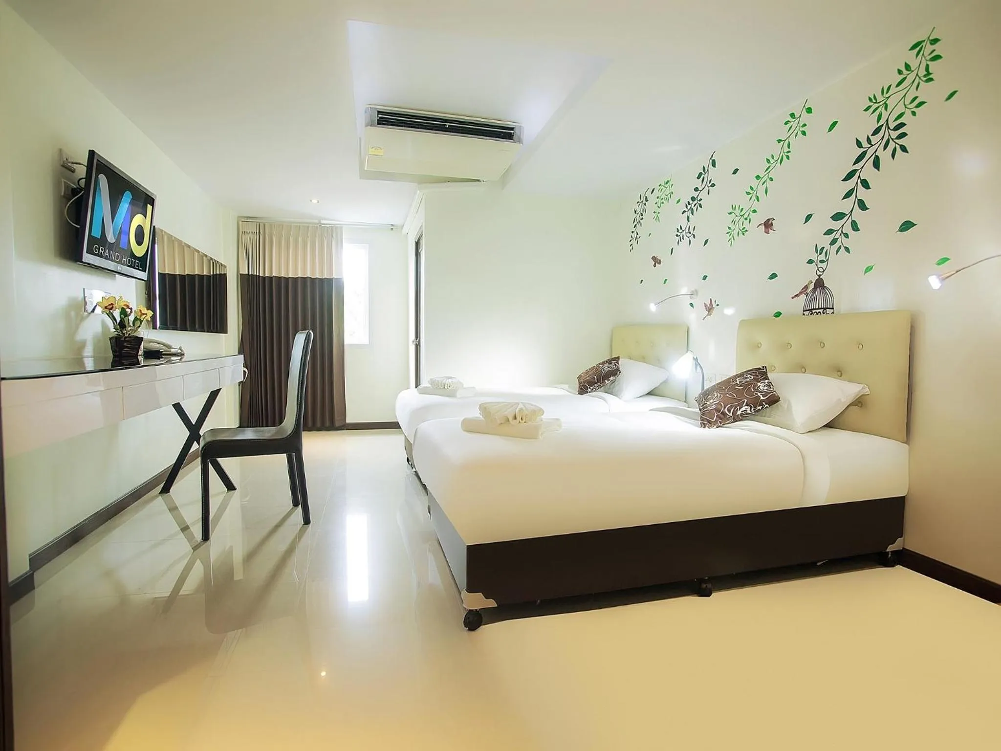Bedroom in MD Grand Hotel Nakhon