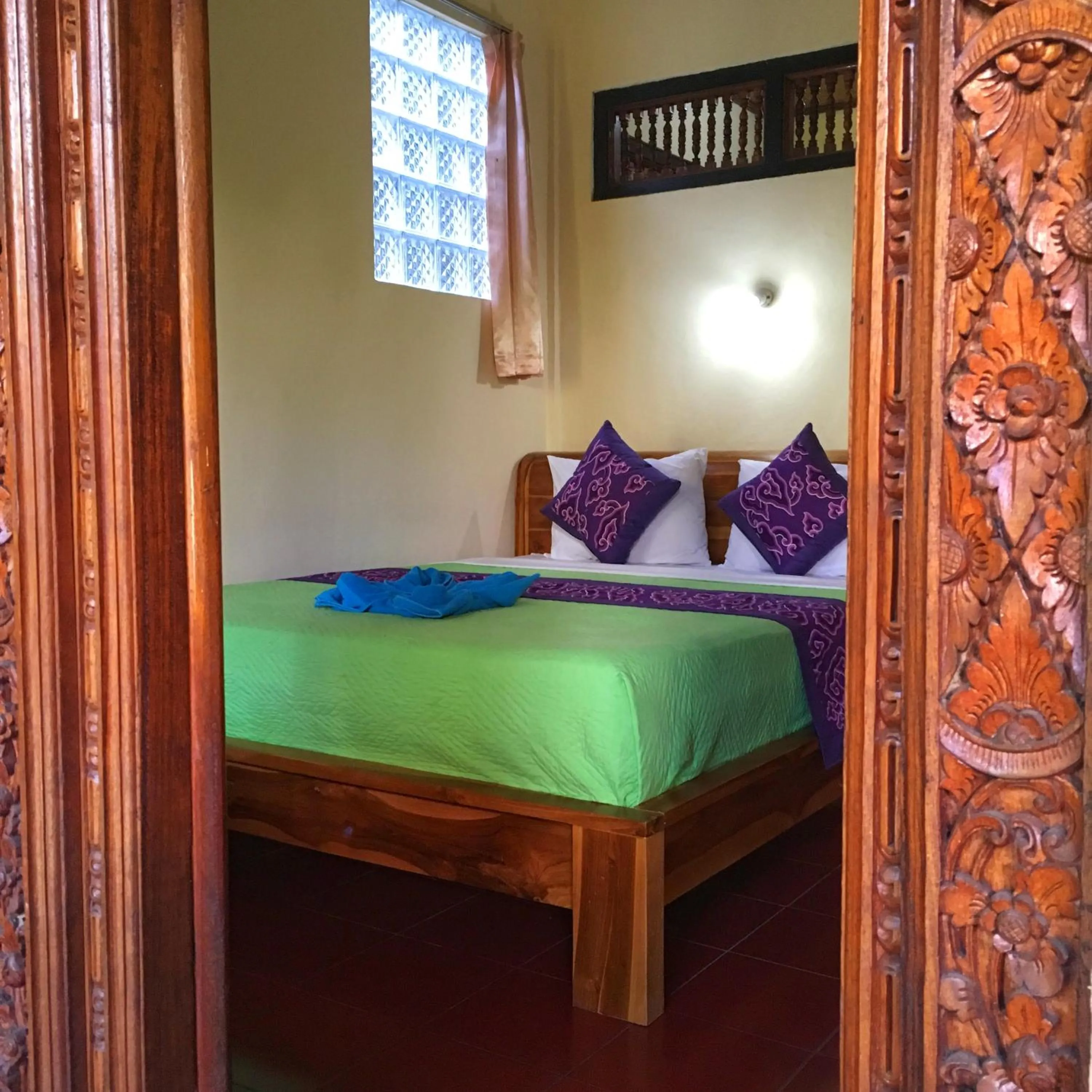 Bed in Merthayasa Bungalows