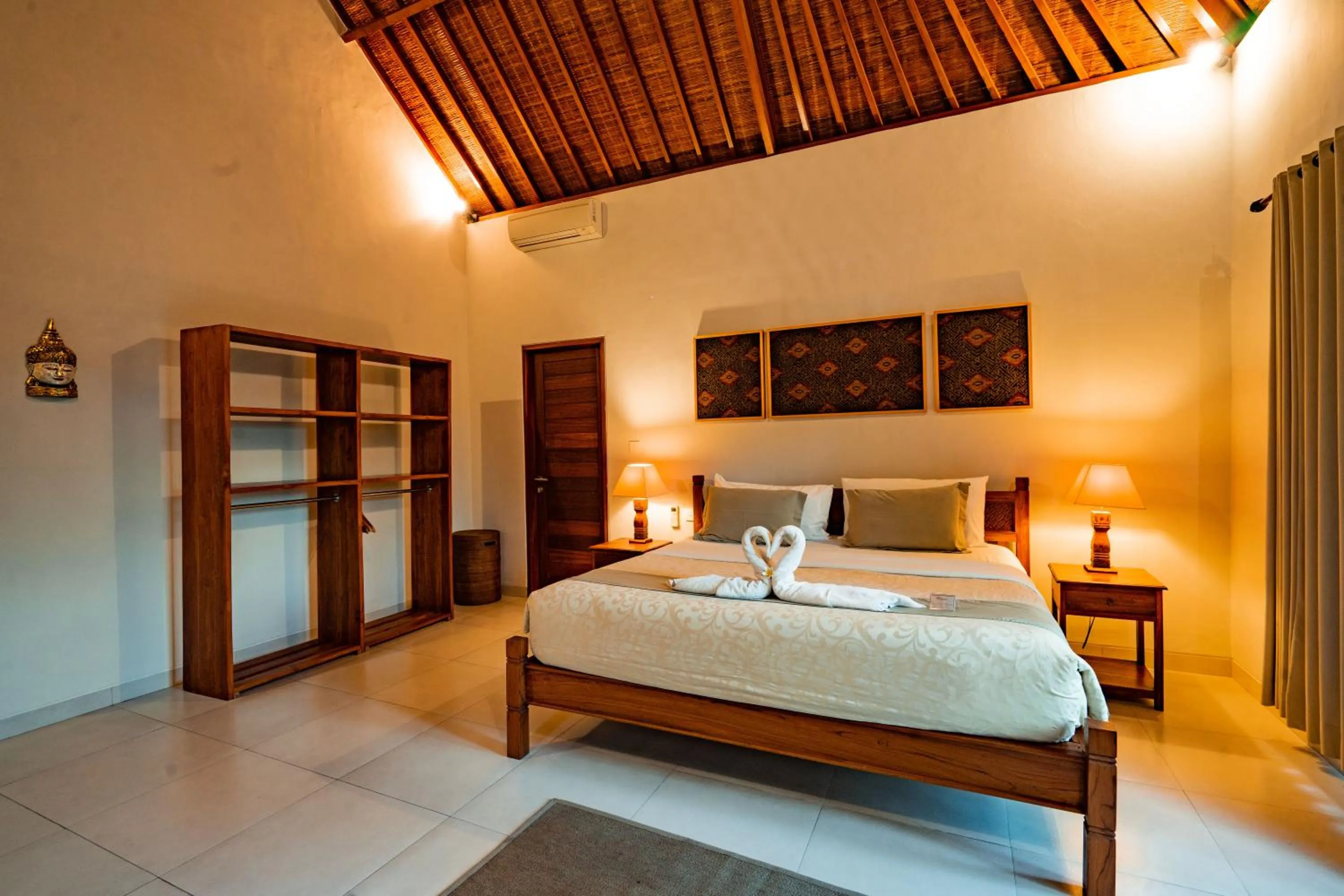 Photo of the whole room, Bed in Casa Margarita Bali