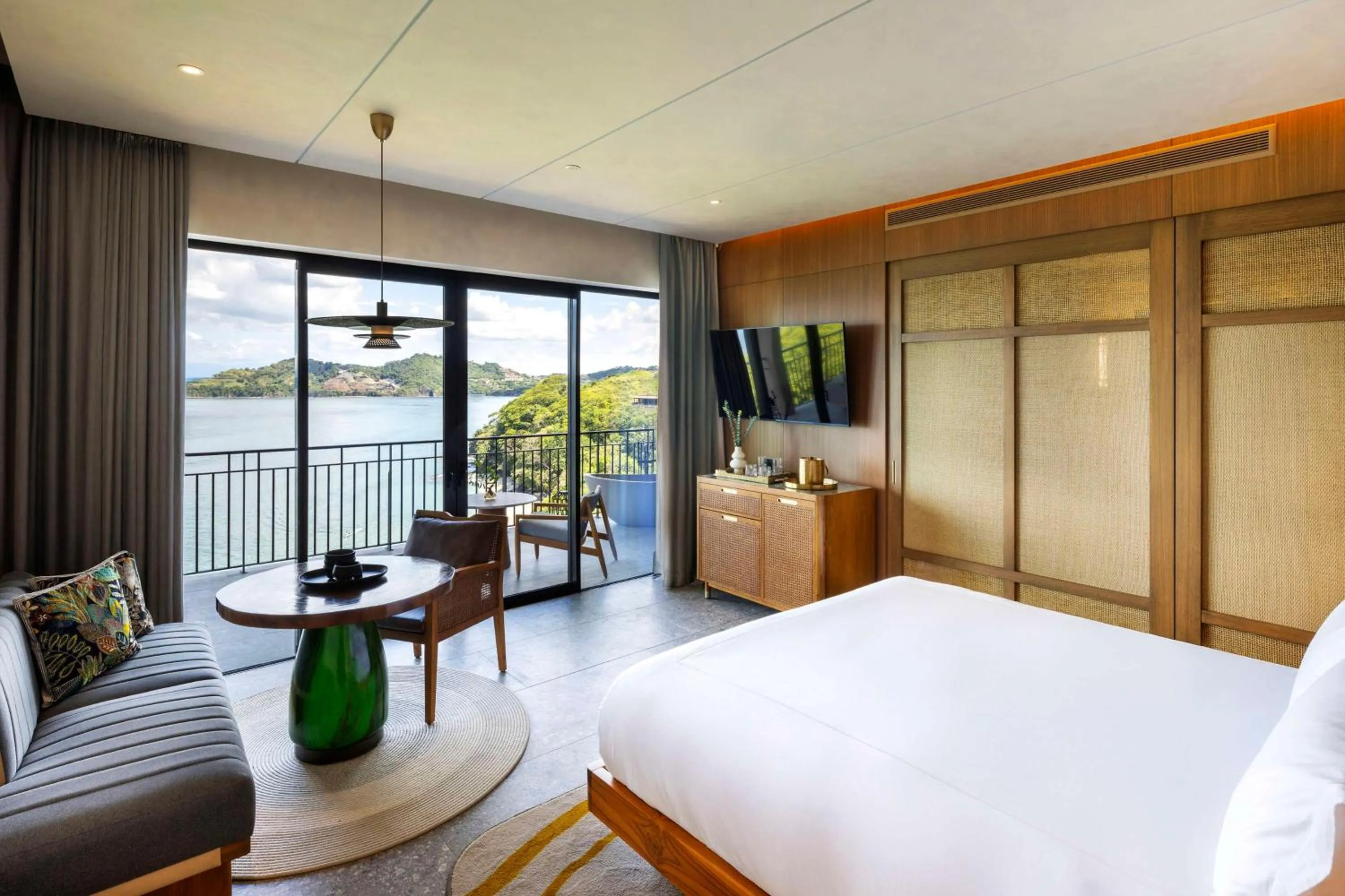 Living room, Bed in Waldorf Astoria Costa Rica Punta Cacique