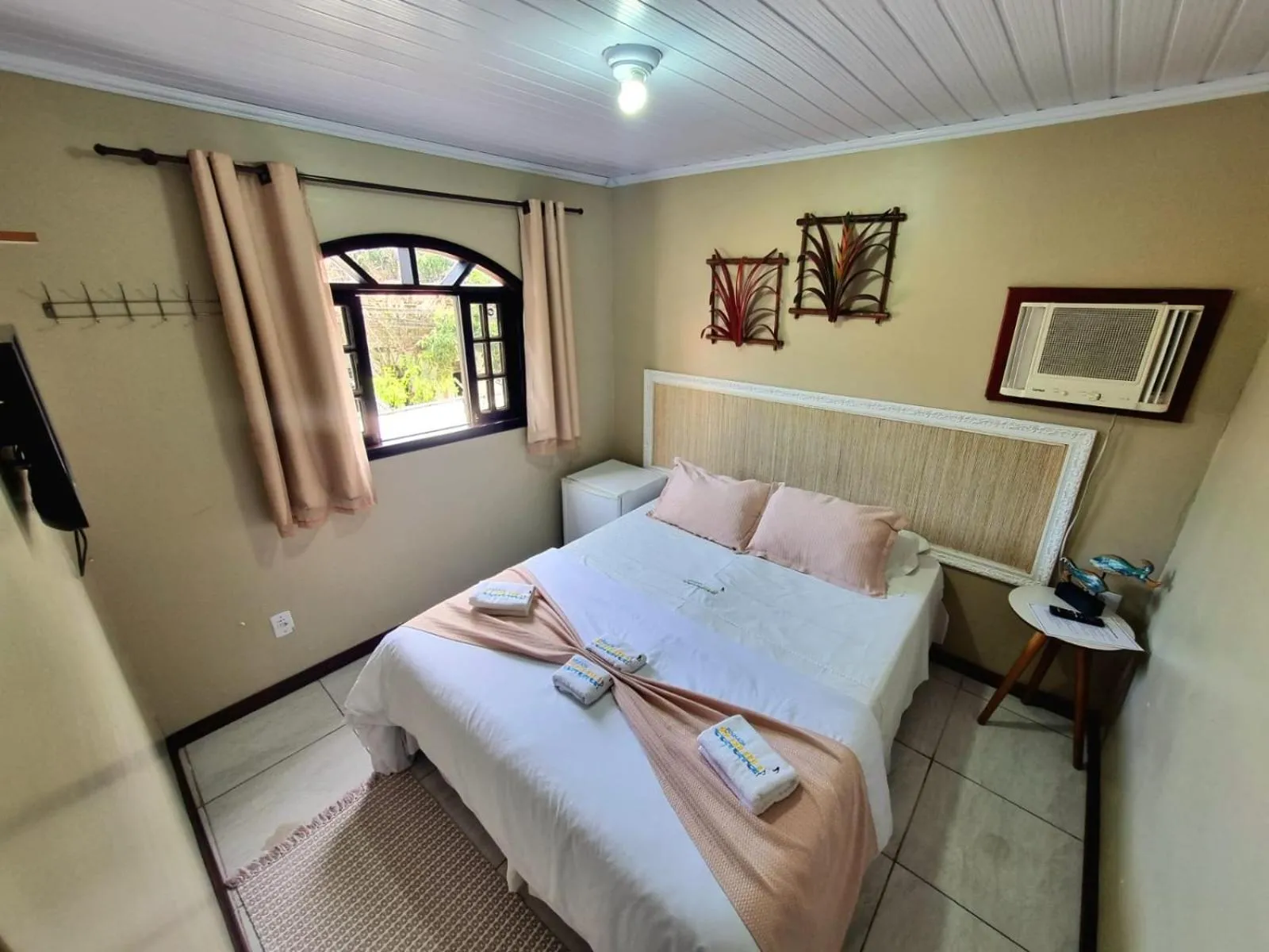 Bed in Pousada Tuiuiu