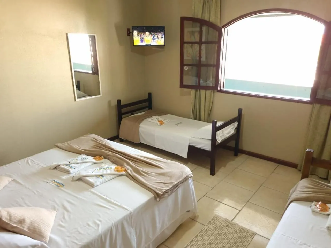 Bed in Pousada Tuiuiu
