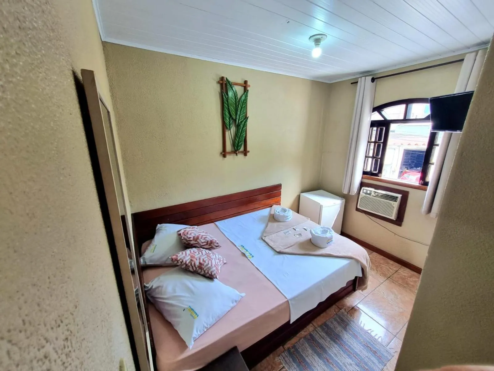 Bed in Pousada Tuiuiu
