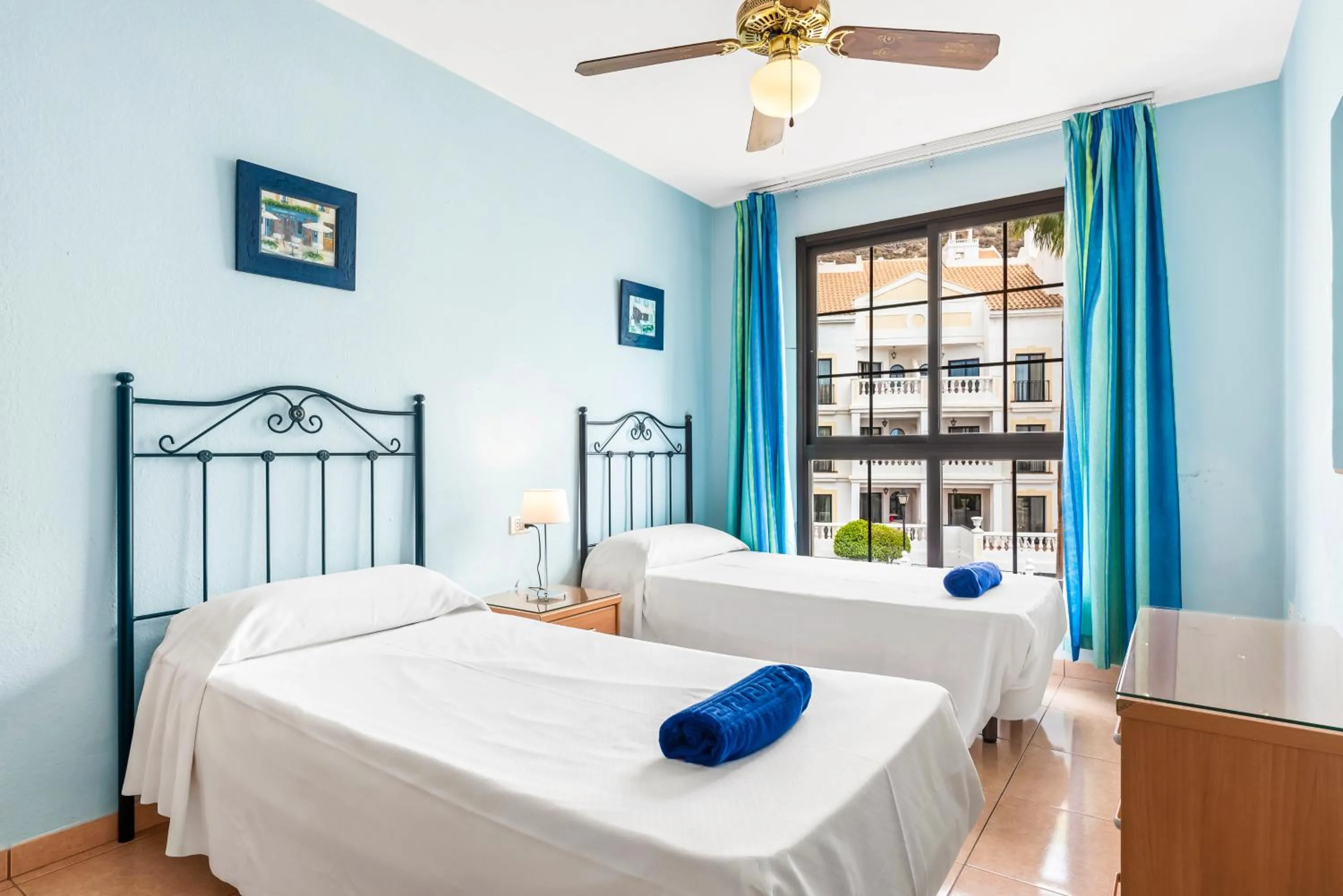 Bed in Club Tenerife Apartments