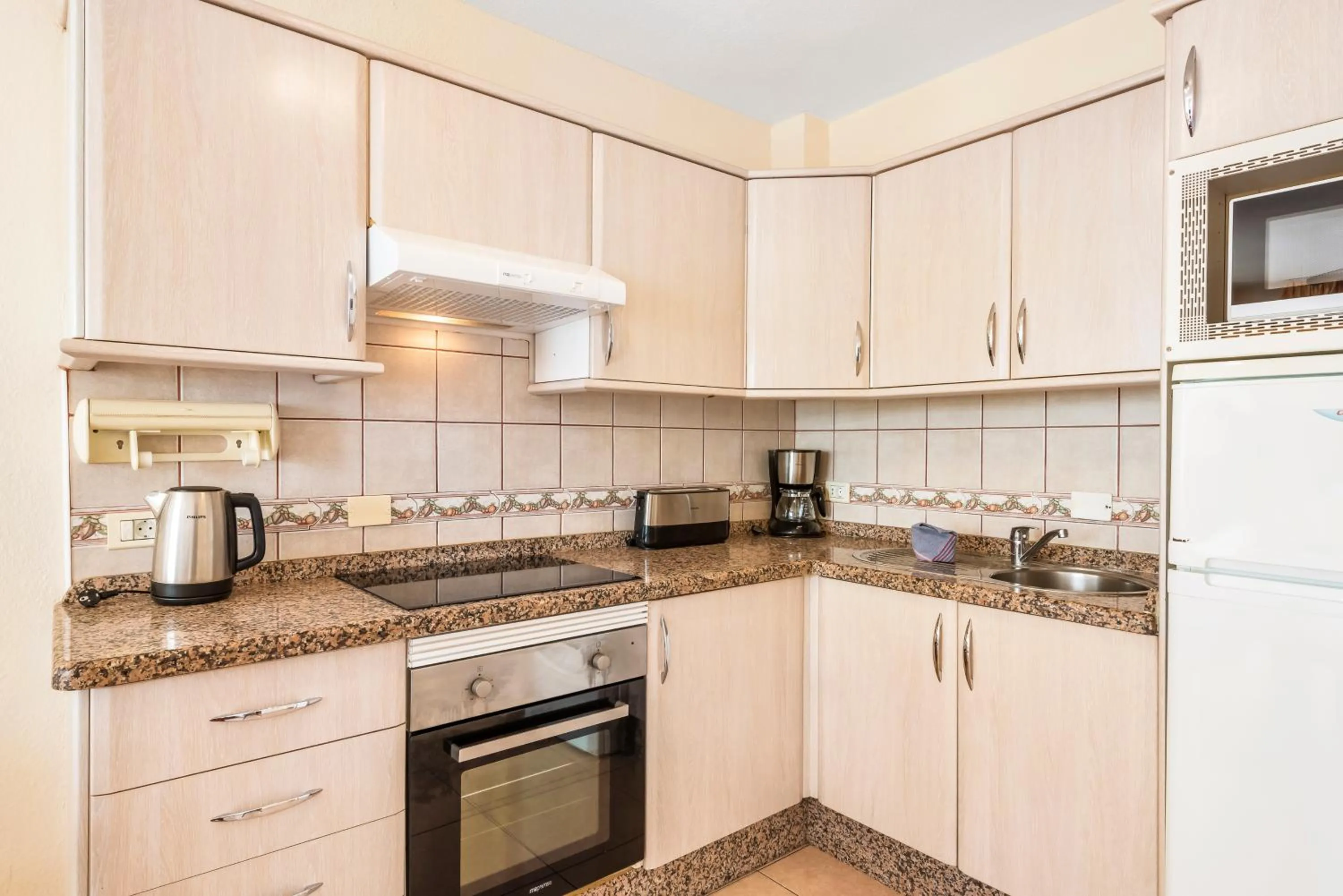 kitchen in Club Tenerife Apartments