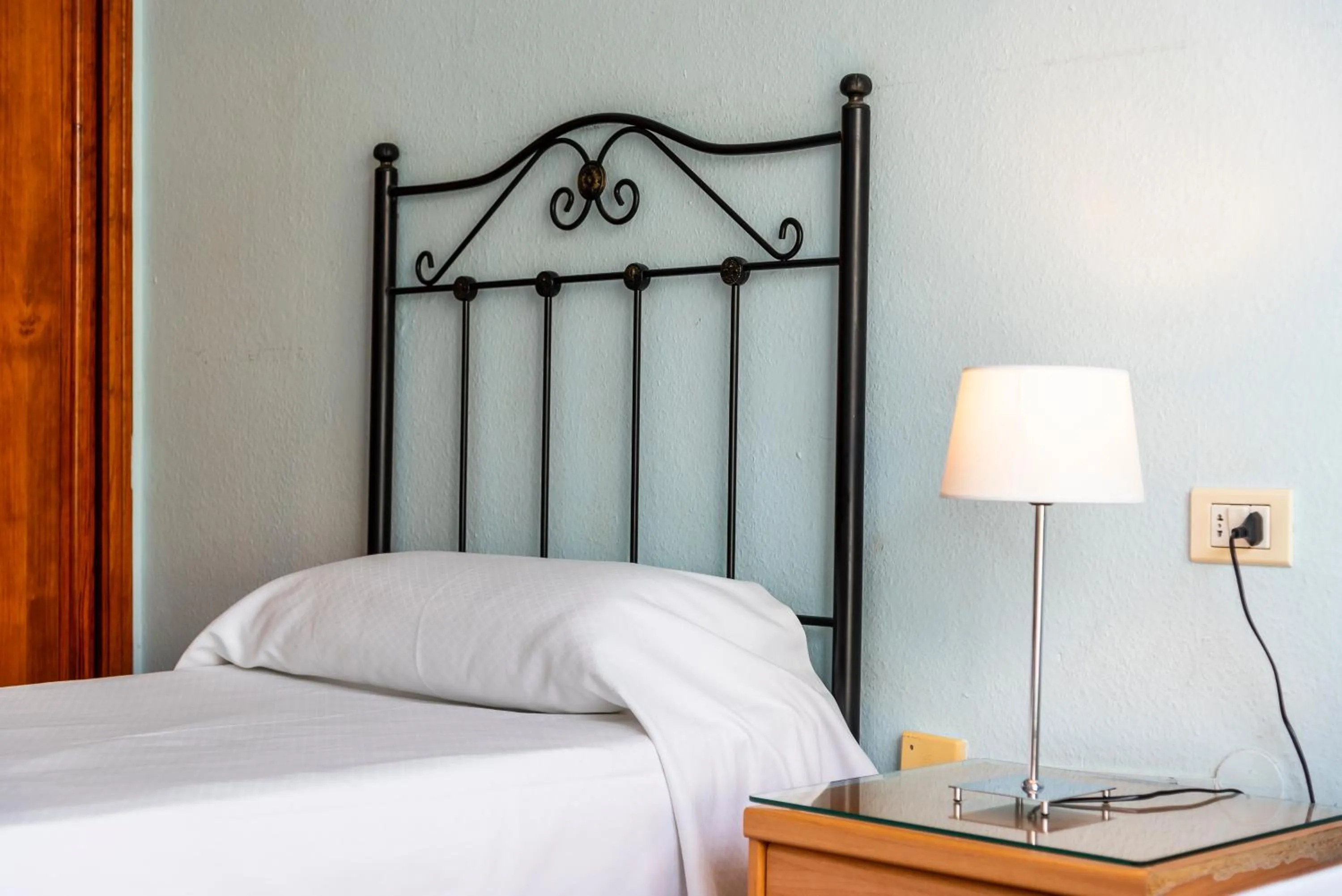 Bed in Club Tenerife Apartments