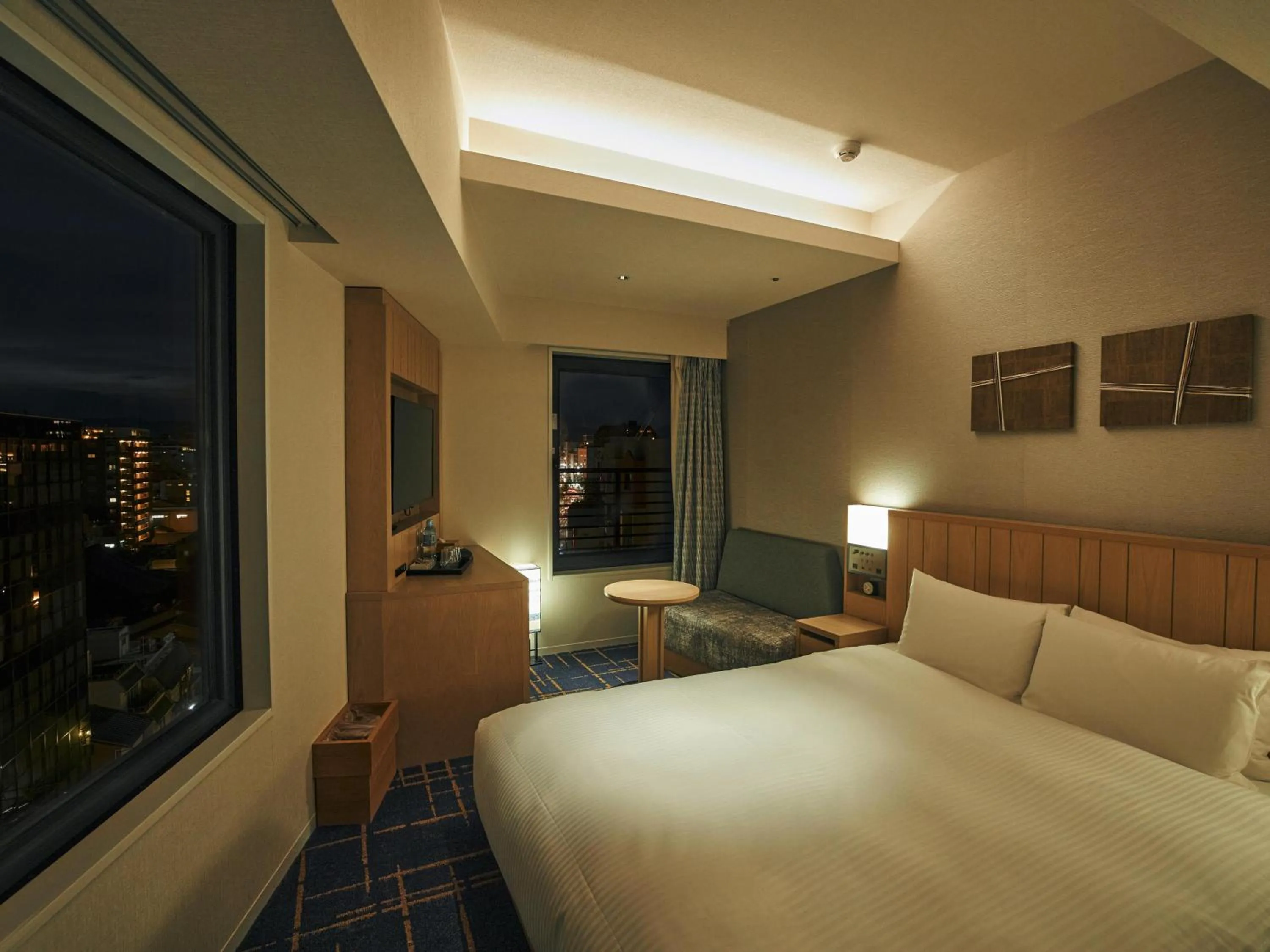 Bed in Hotel Traveltine Kyoto Kiyamachi