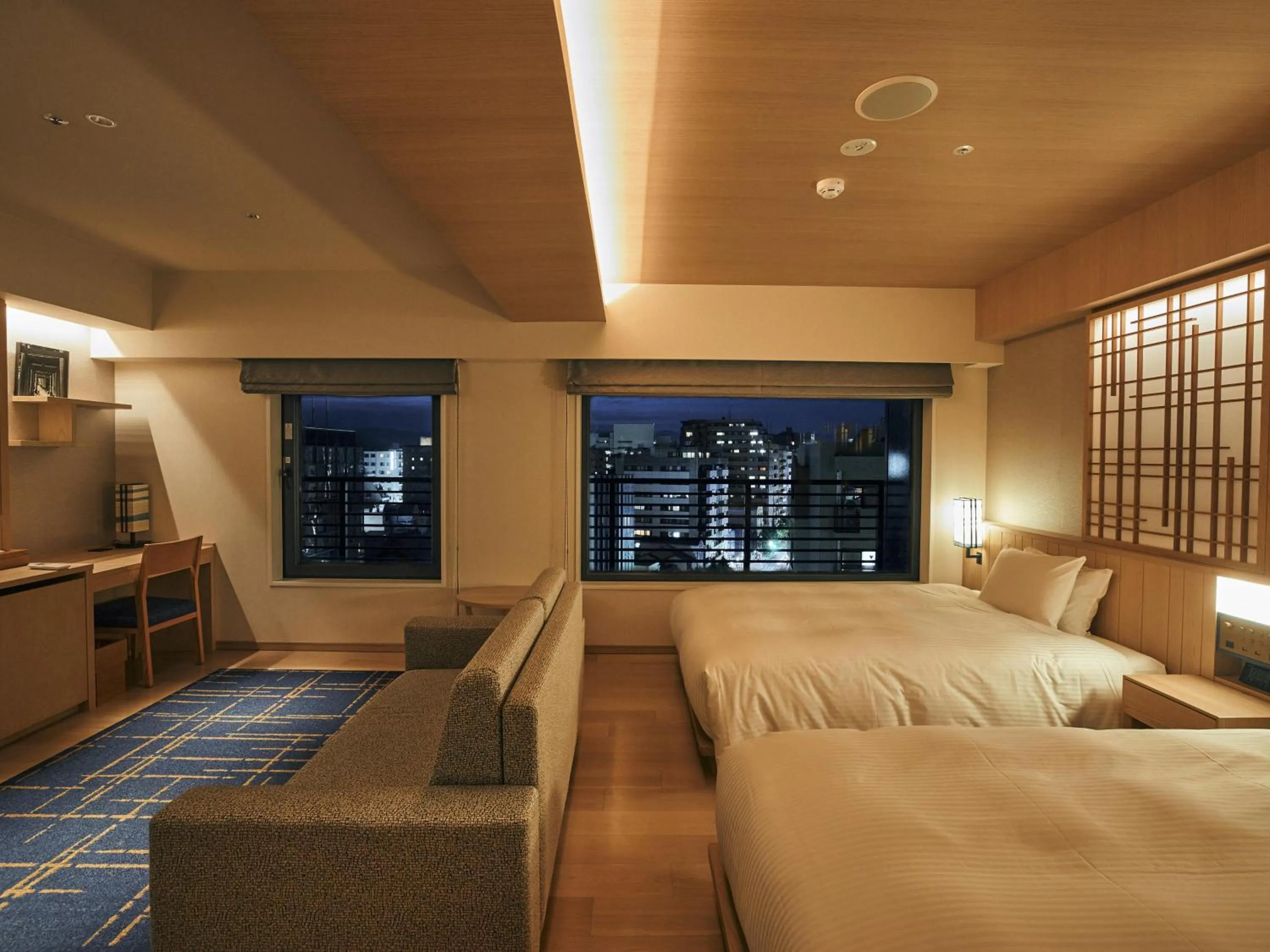 Bed in Hotel Traveltine Kyoto Kiyamachi