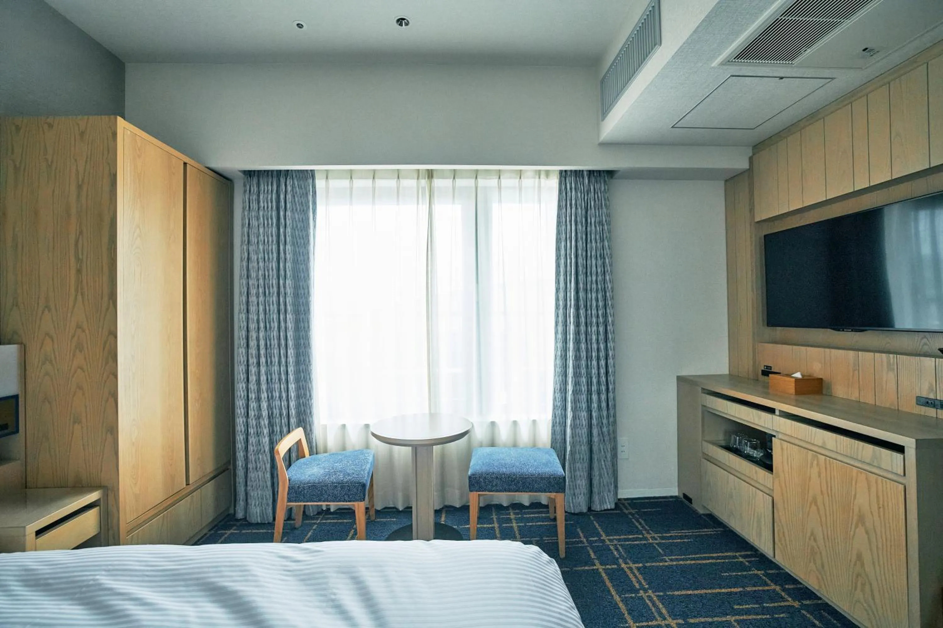 Bed in Hotel Traveltine Kyoto Kiyamachi