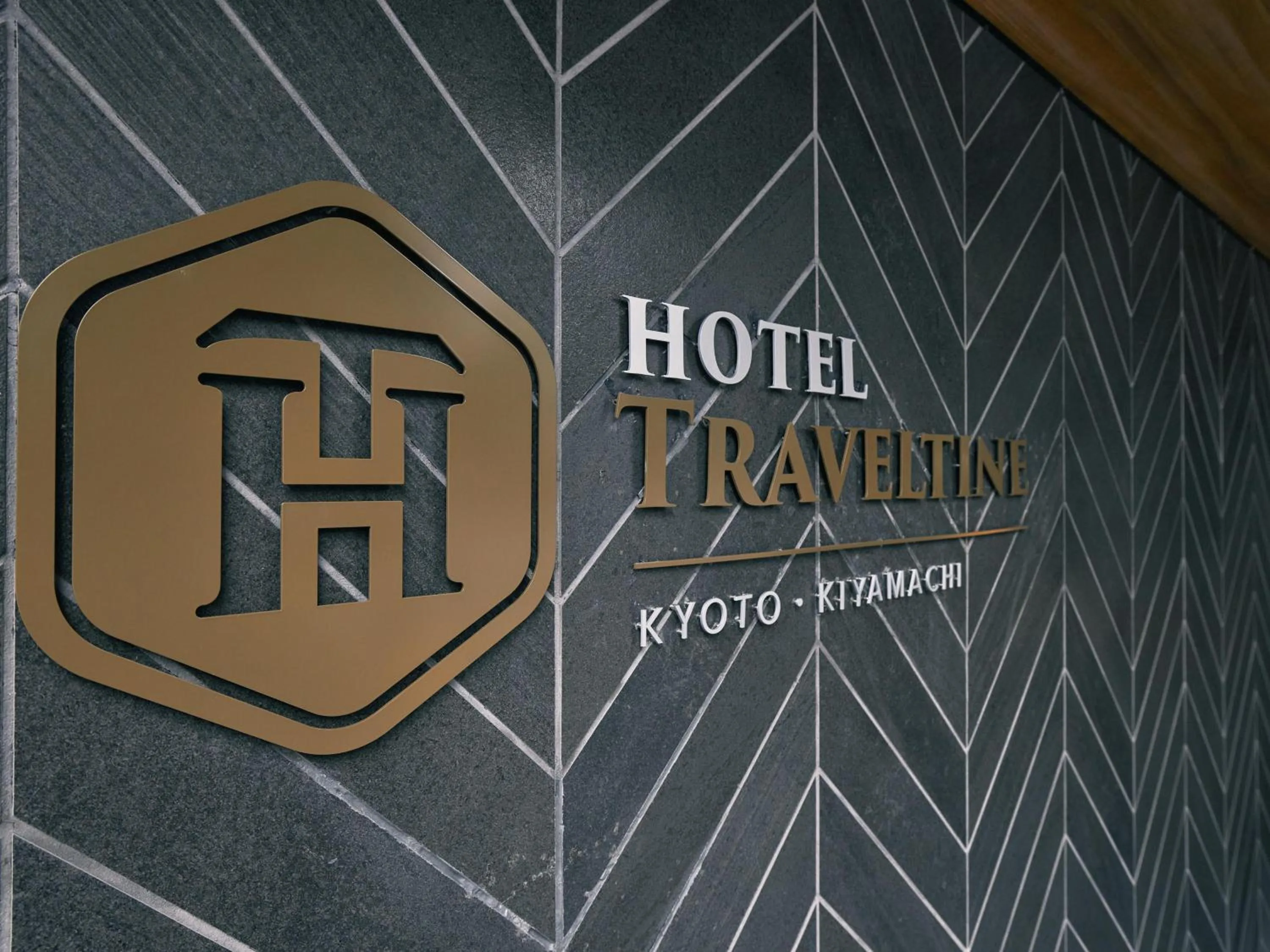 Property logo or sign in Hotel Traveltine Kyoto Kiyamachi