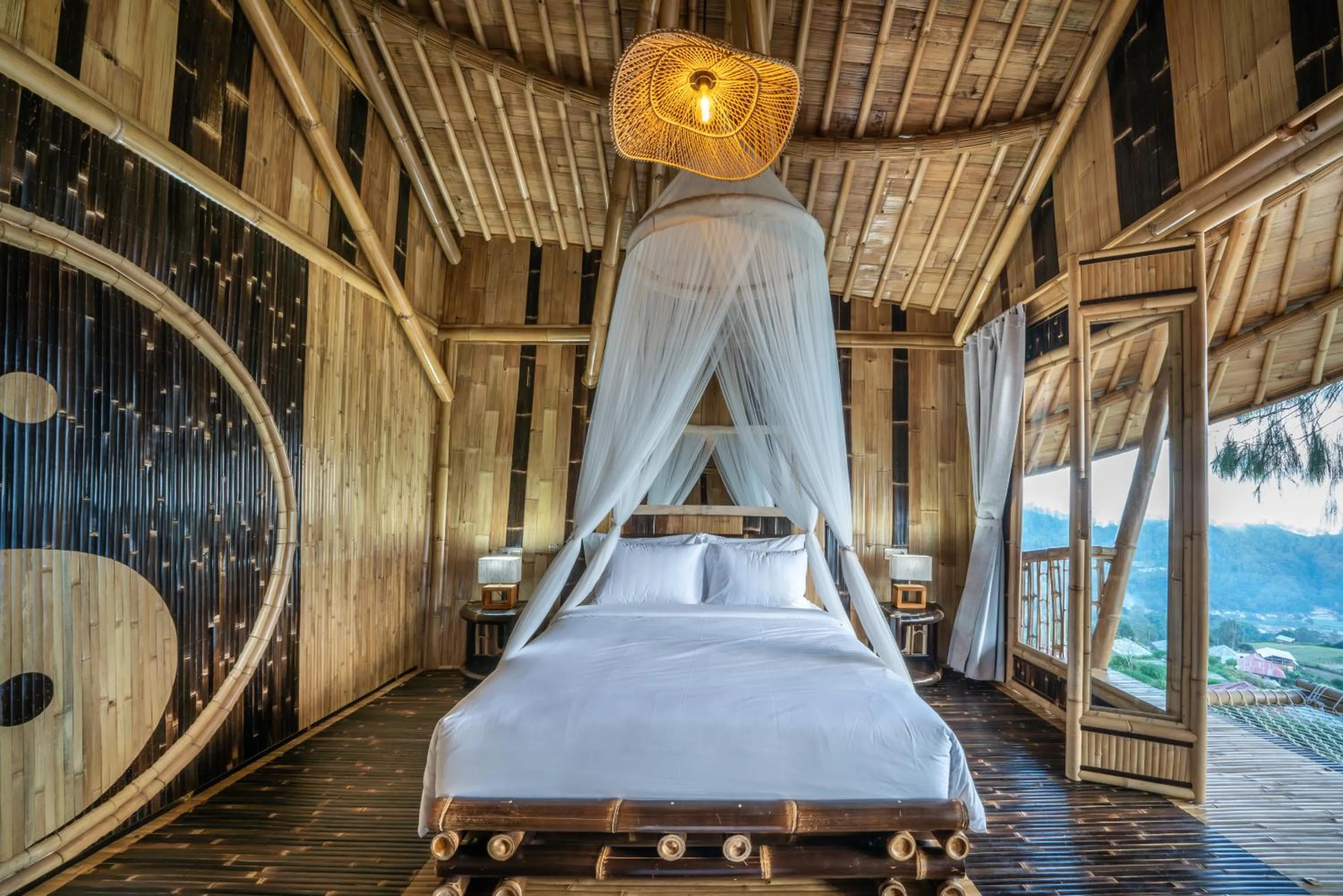 Bed in The Dewi Eco Bamboo Villa