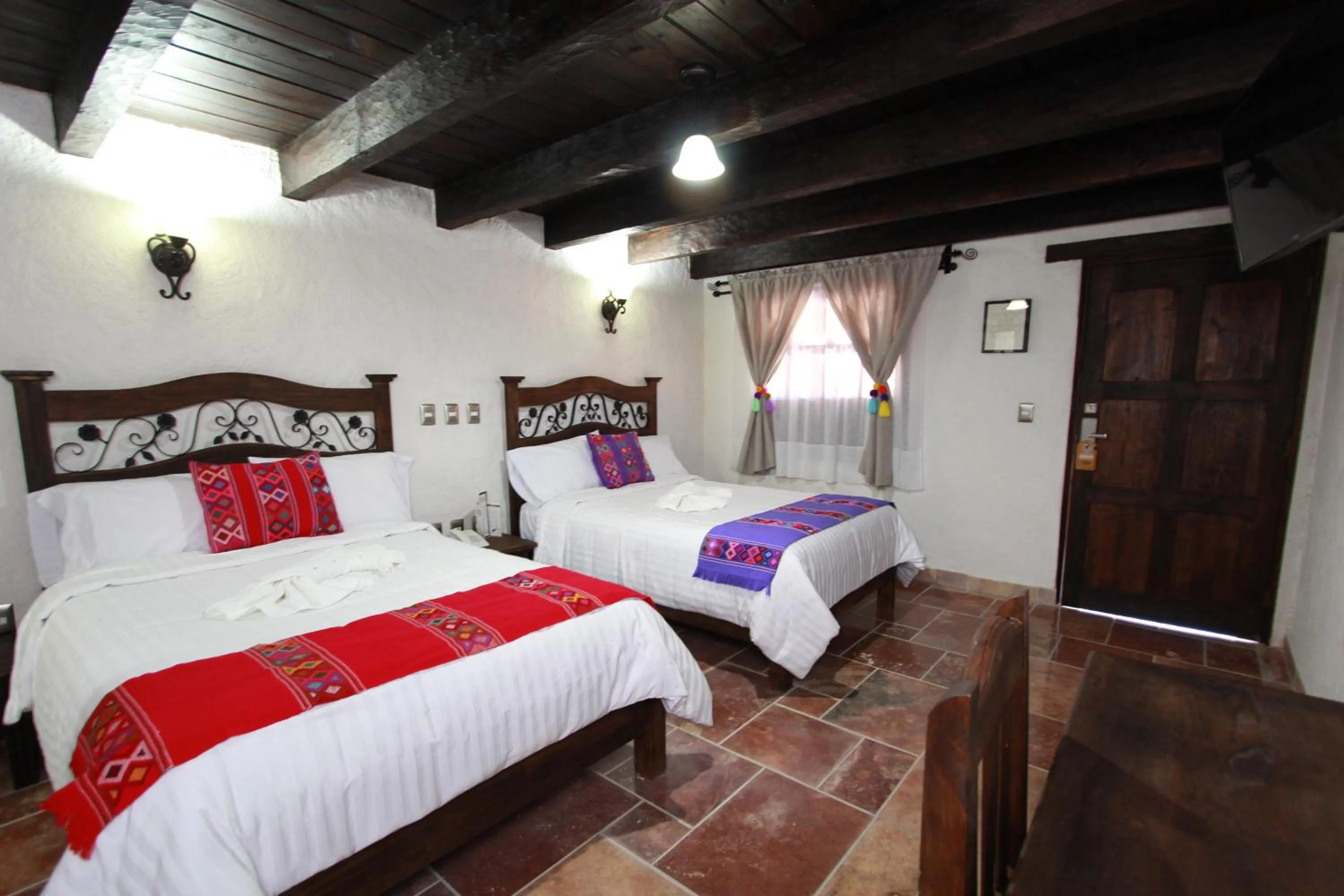 Bed in HOTEL PLAZA SAN CRISTOBAL INN