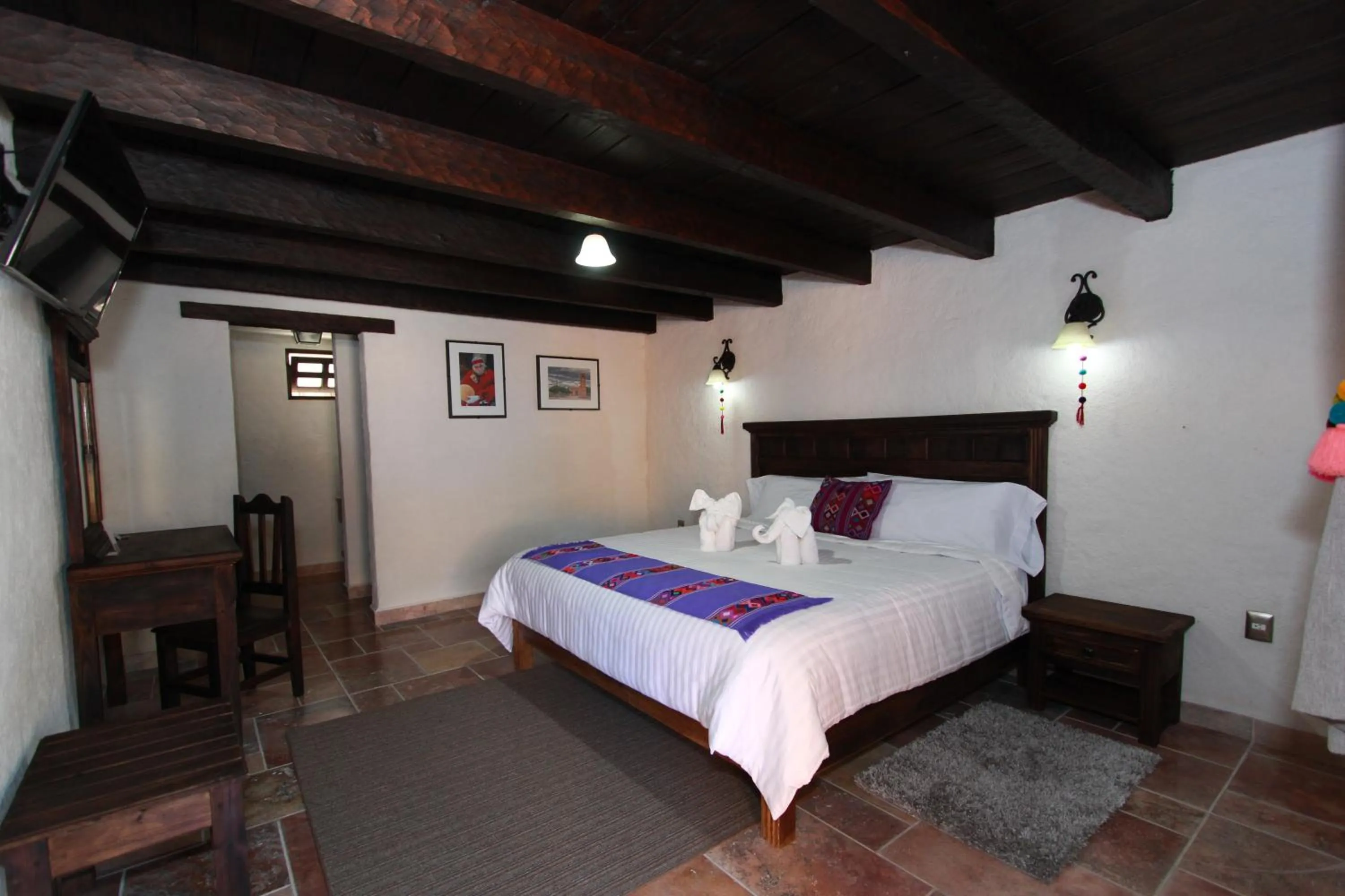 Bed in HOTEL PLAZA SAN CRISTOBAL INN