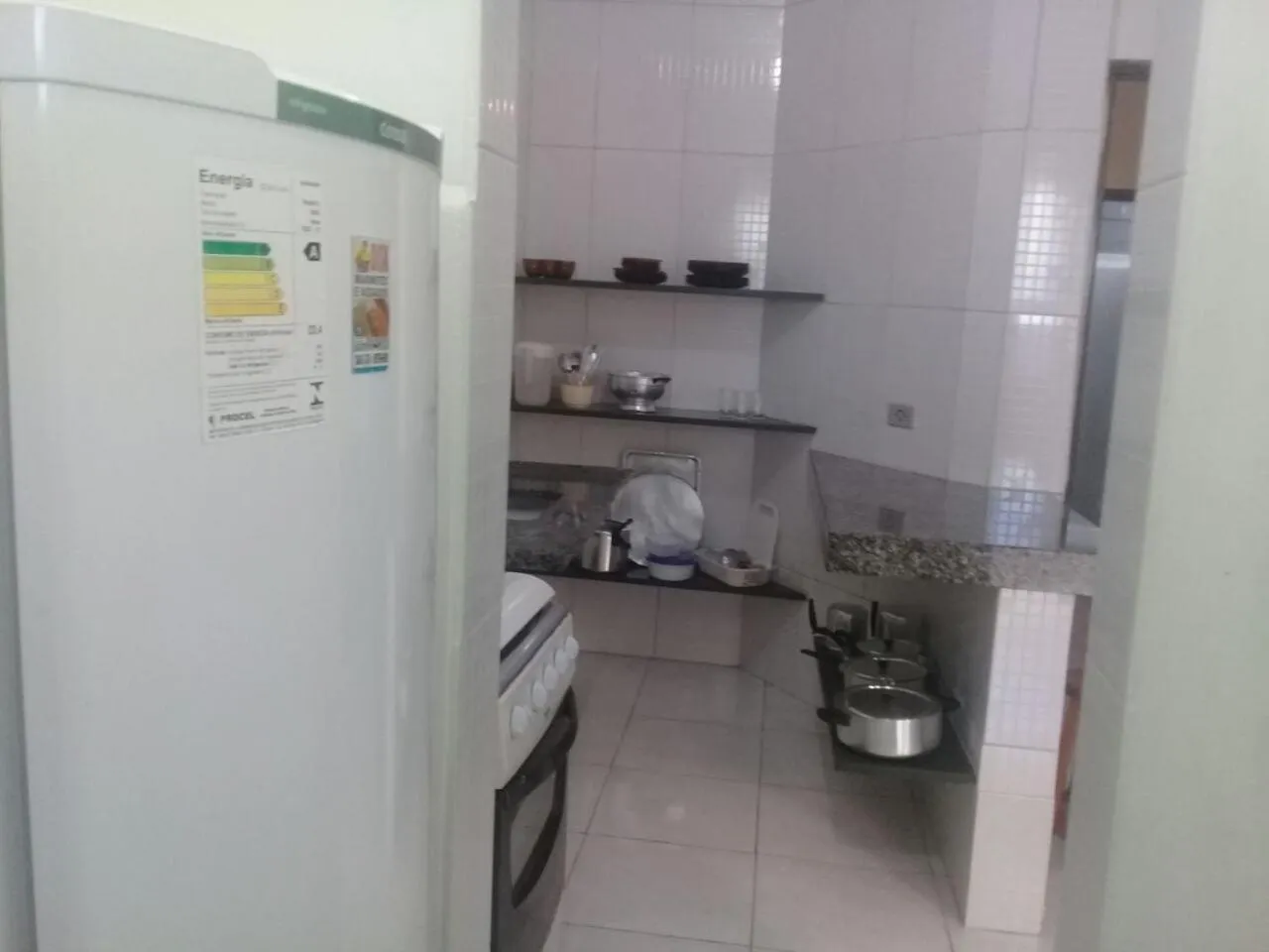 Communal kitchen in Cond Apartamentos Chalés San Marino