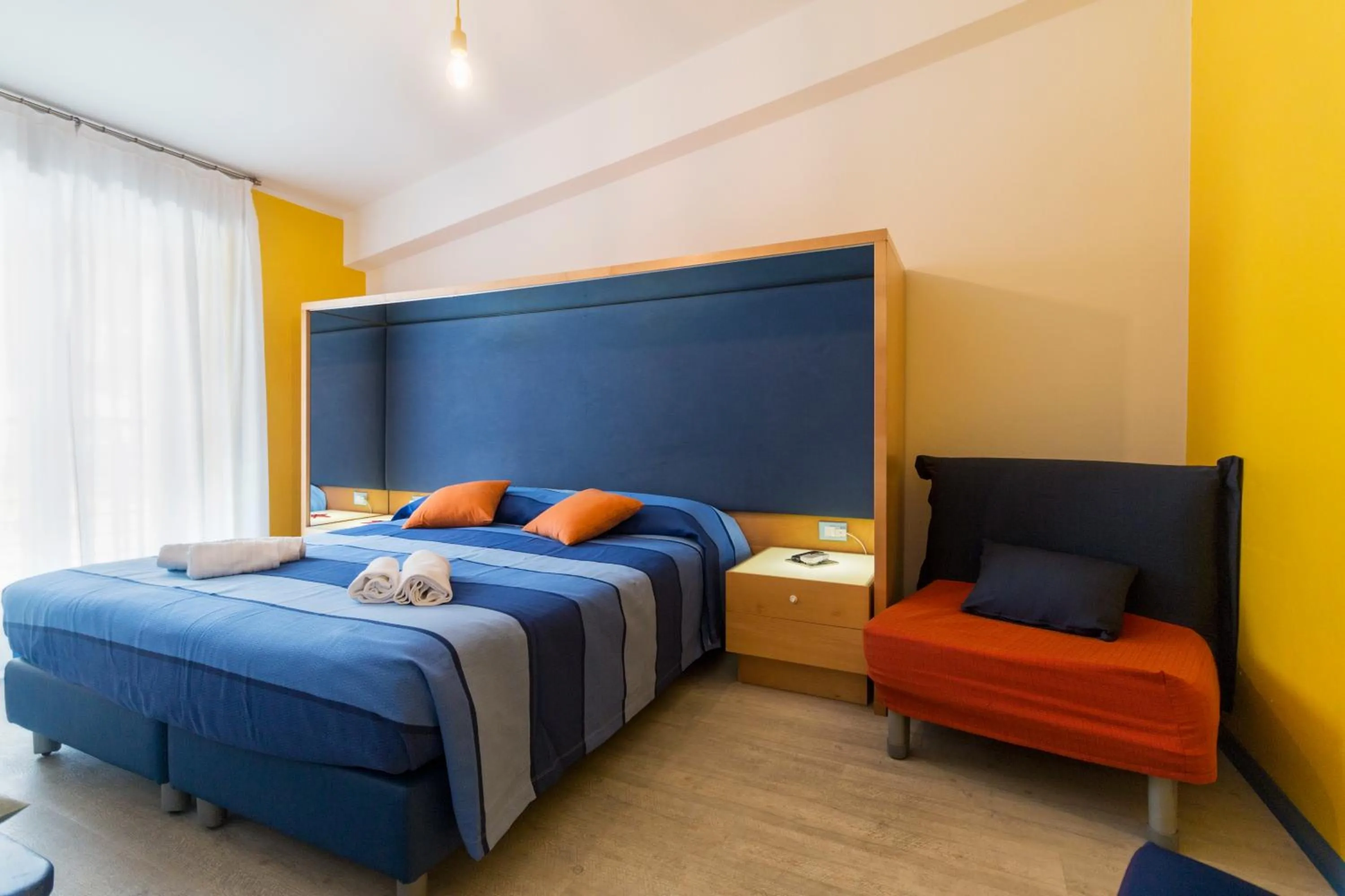 Bed in La Favorita Hotel