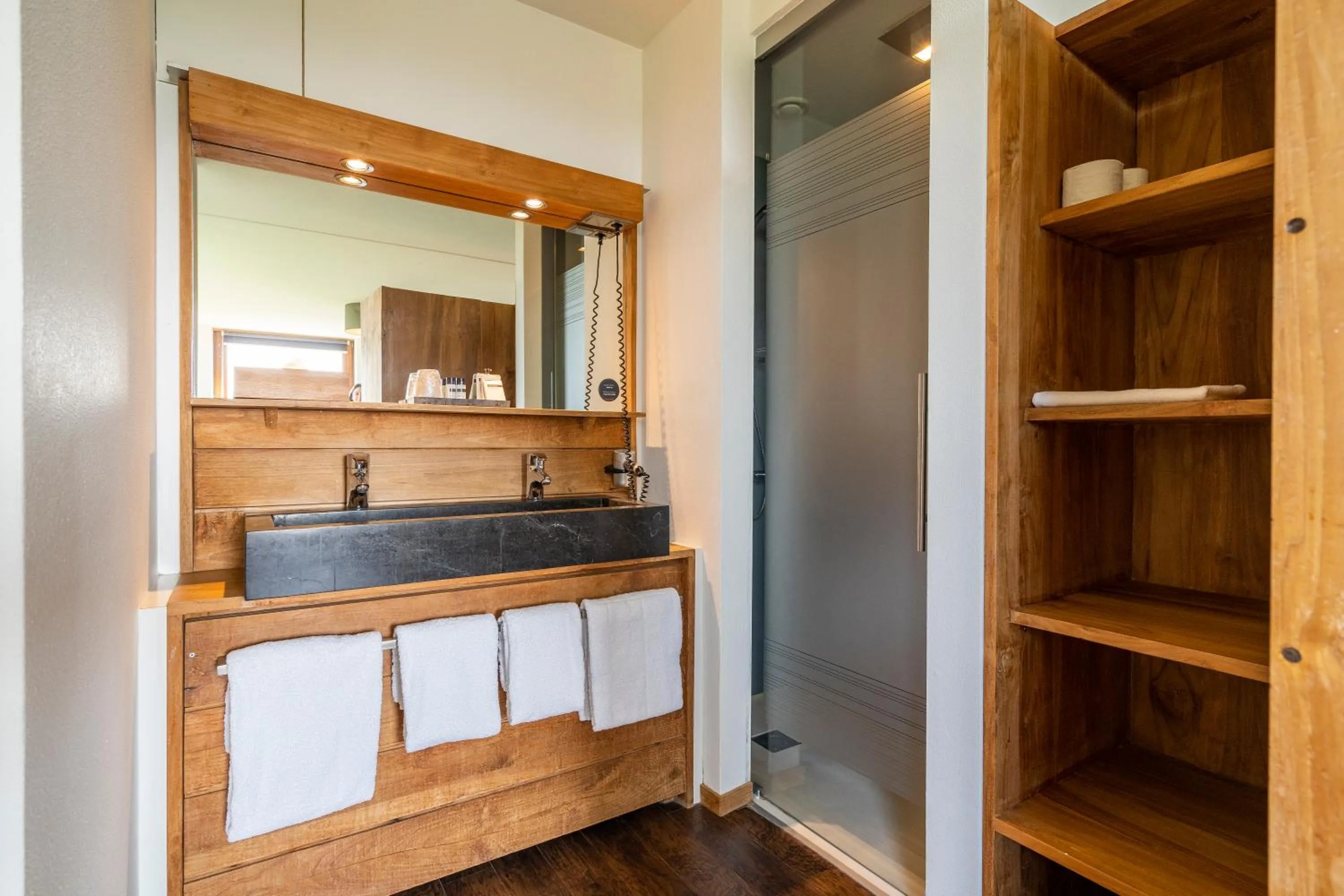 Toilet in Alpine Hotel by SnowWorld