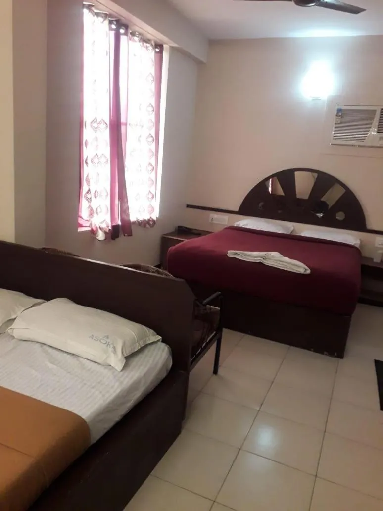 Bed in Asoka Inn