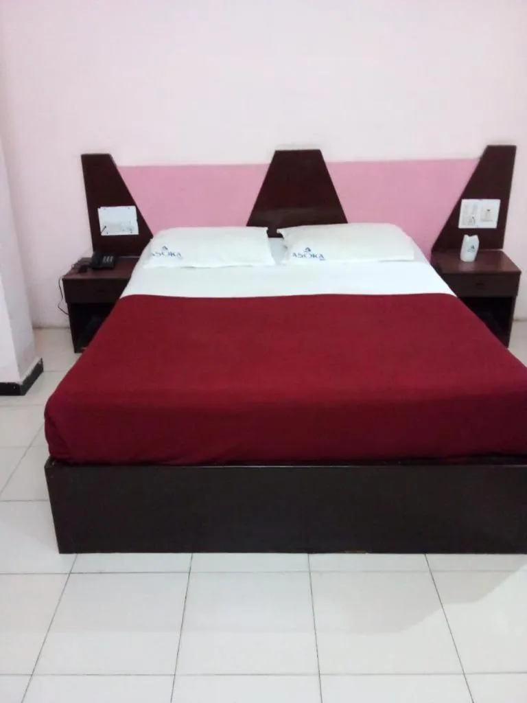 Bed in Asoka Inn