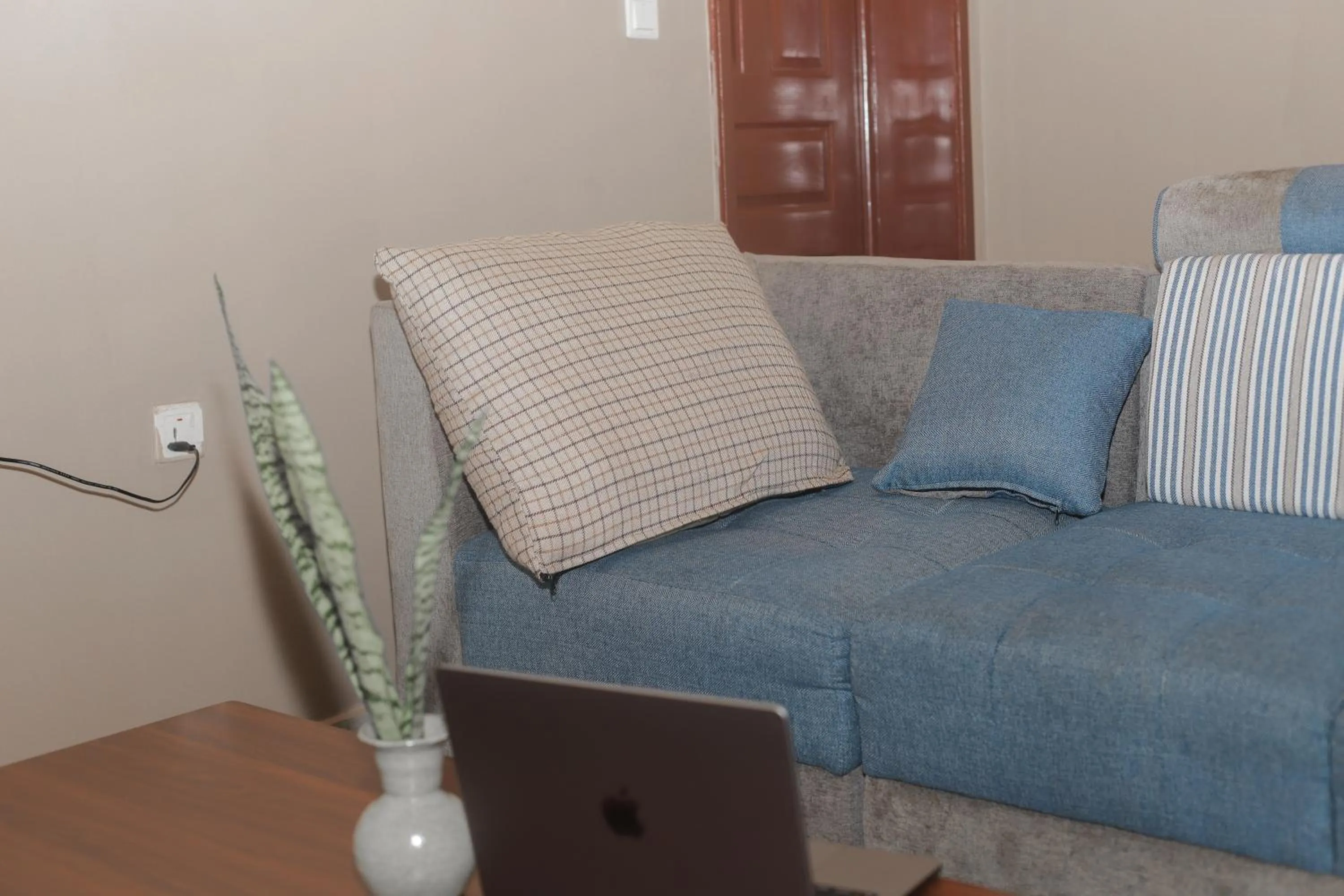 Communal lounge/ TV room in OMX Hotel Remera