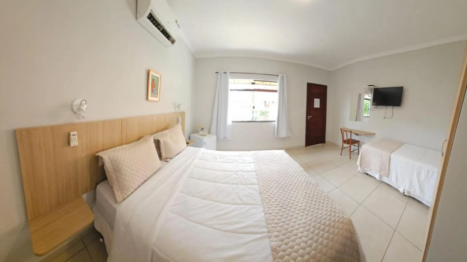 Bed in Vila Francesa Hotel