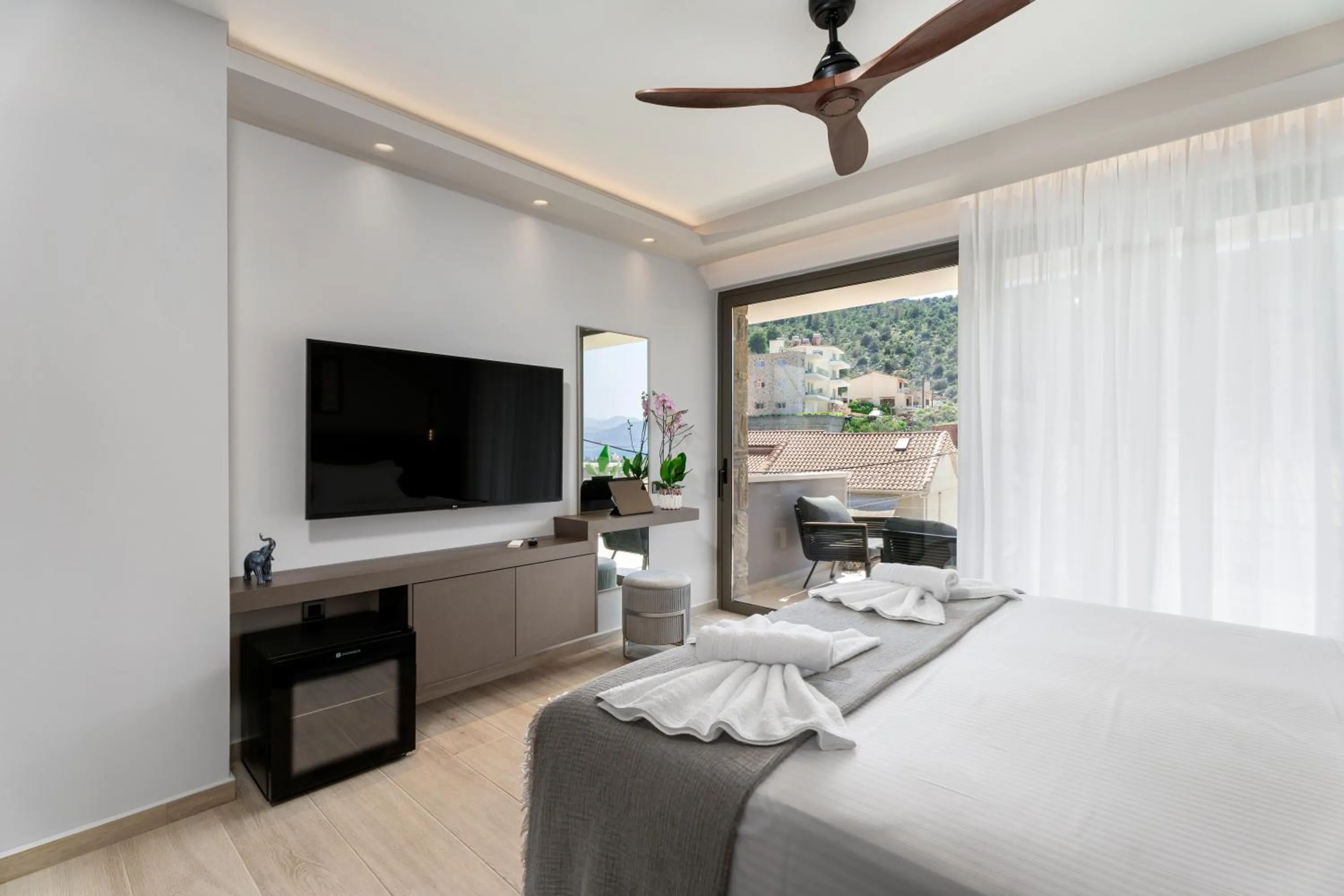 Bed in Ennea Muses Rooms and Suites