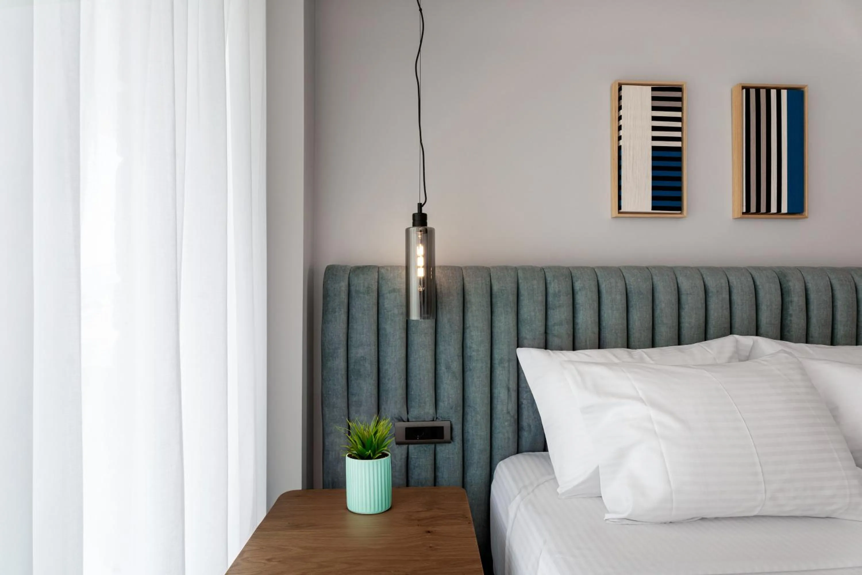 Decorative detail, Bed in Ennea Muses Rooms and Suites