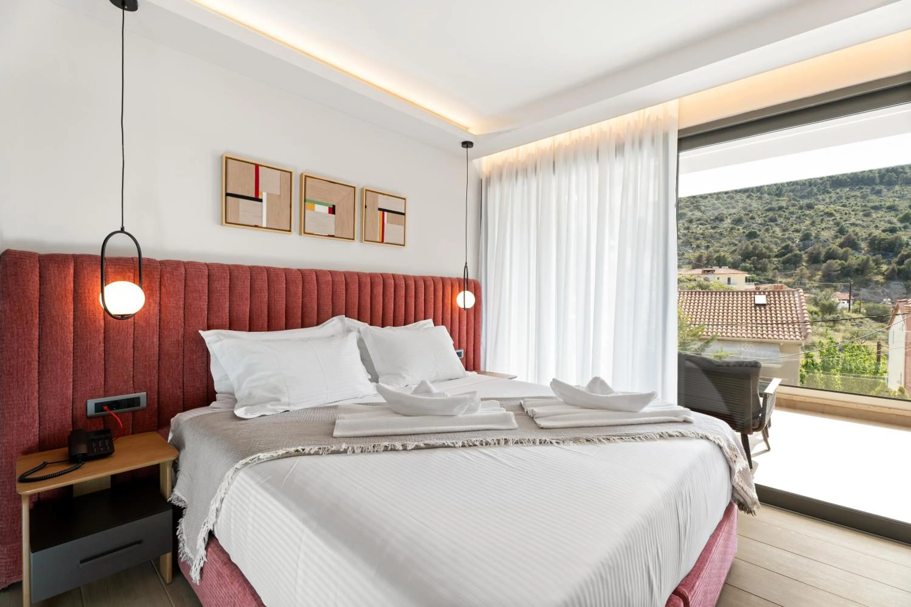 Bed in Ennea Muses Rooms and Suites