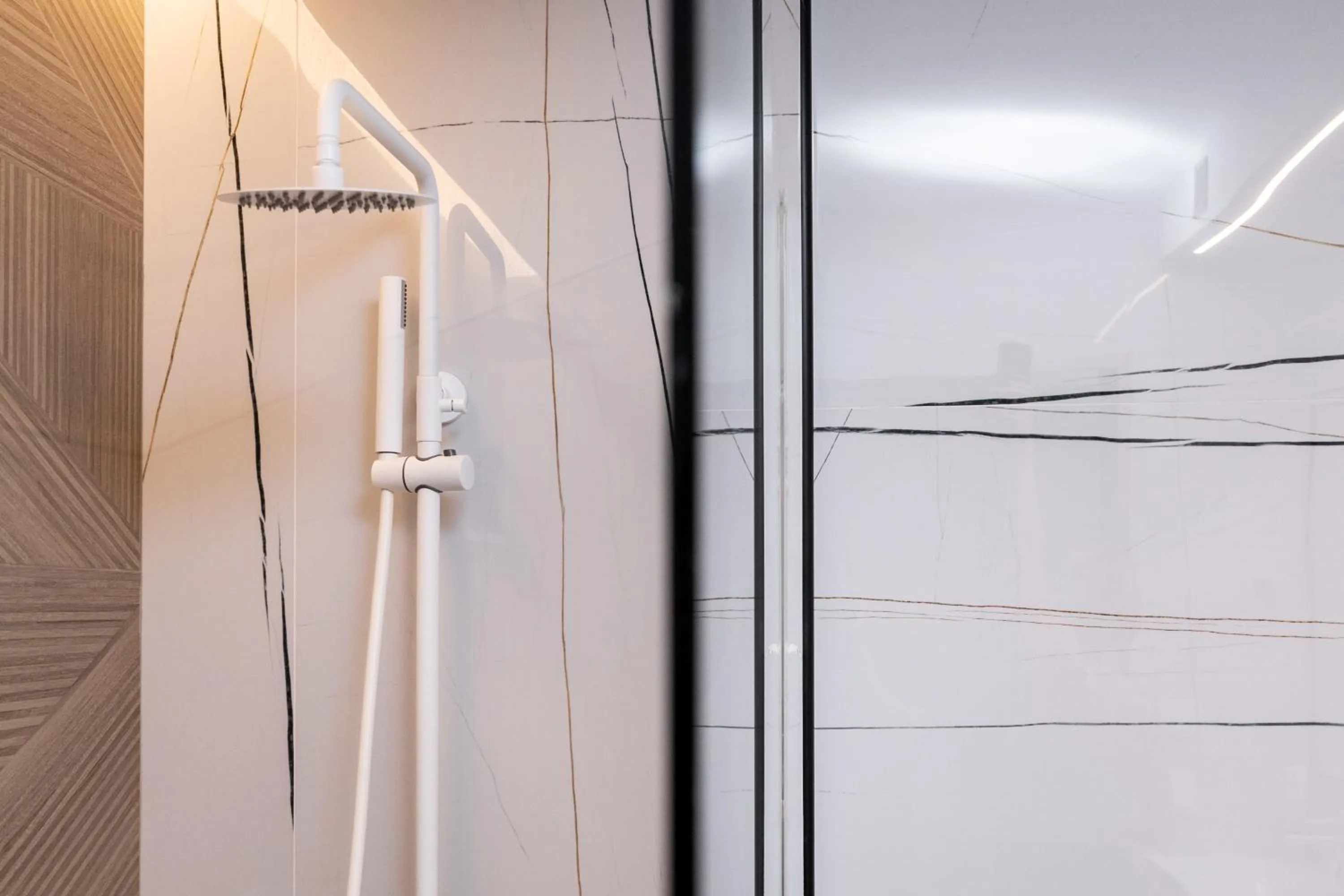 Shower in Ennea Muses Rooms and Suites