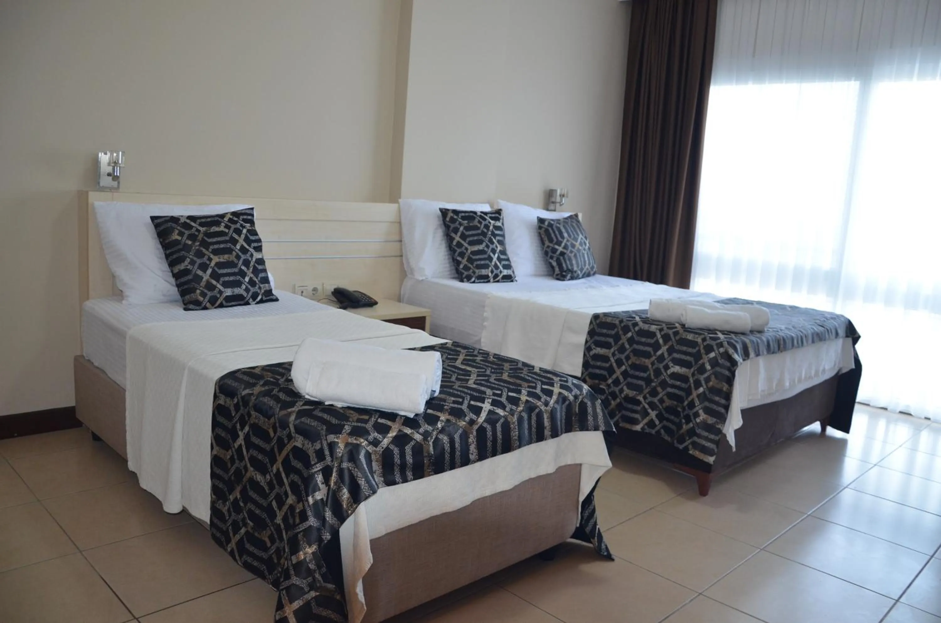 Bed in Denizkumu Hotel