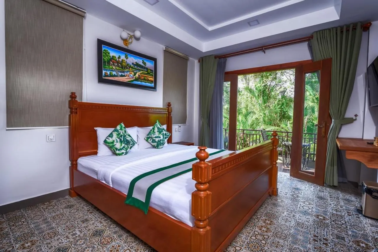 Bed in Ganesha Kampot Resort