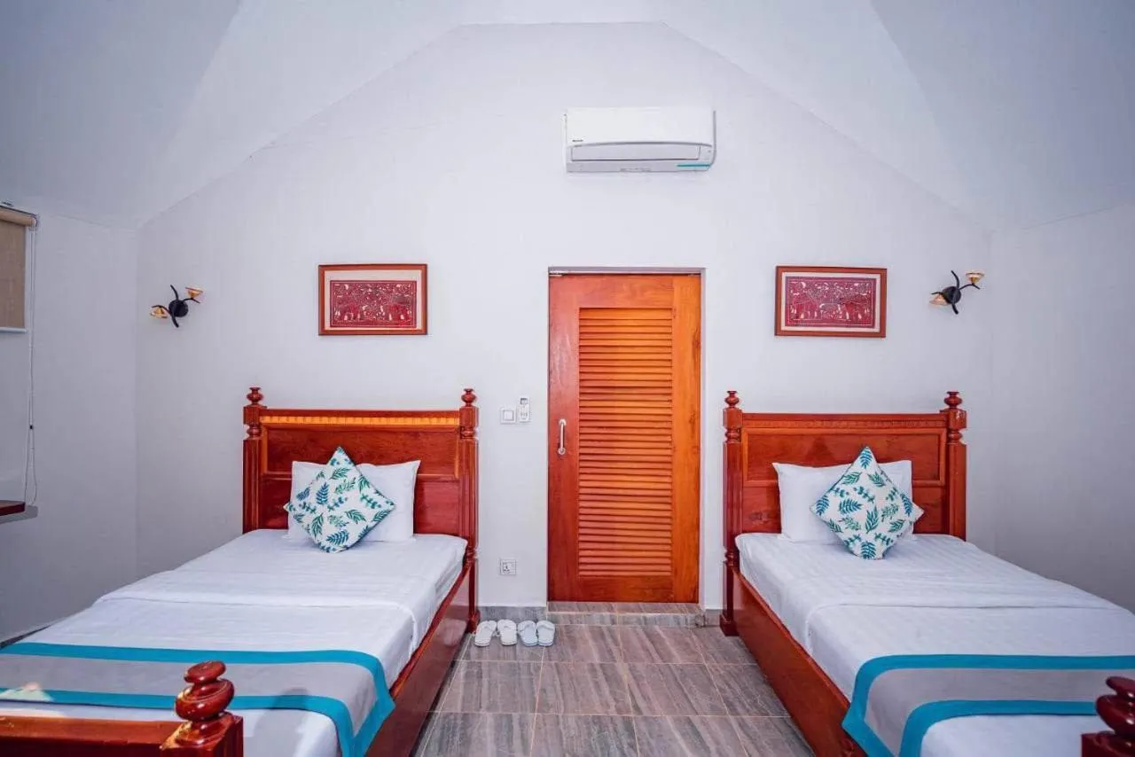 Bed in Ganesha Kampot Resort