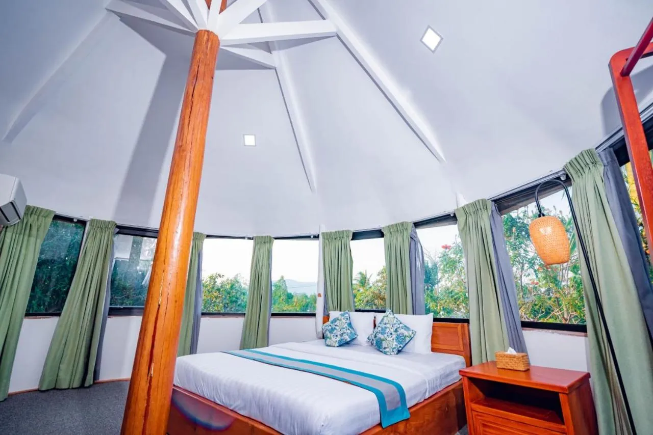 Bed in Ganesha Kampot Resort