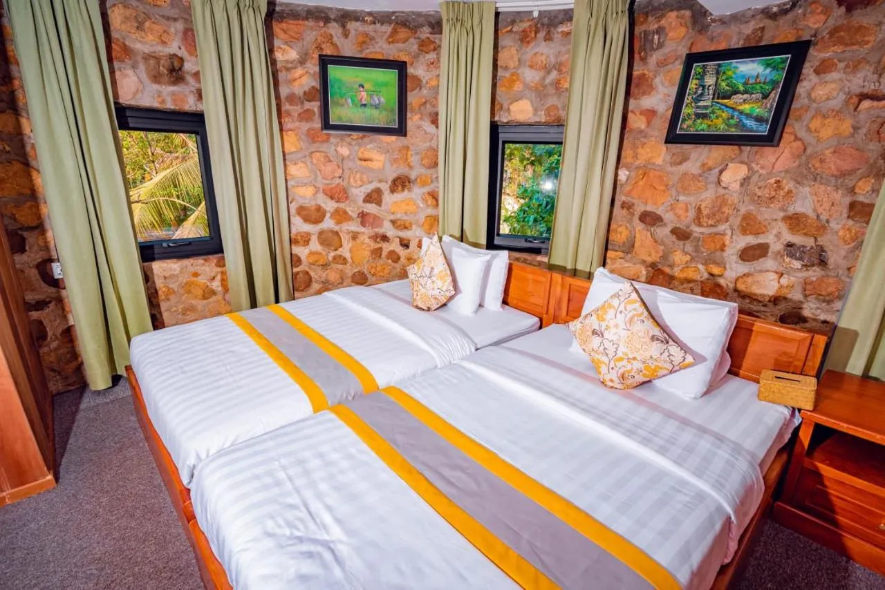 Bed in Ganesha Kampot Resort