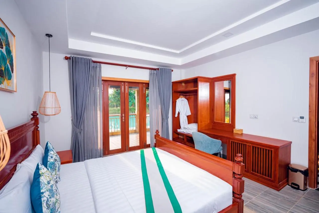 Bed in Ganesha Kampot Resort