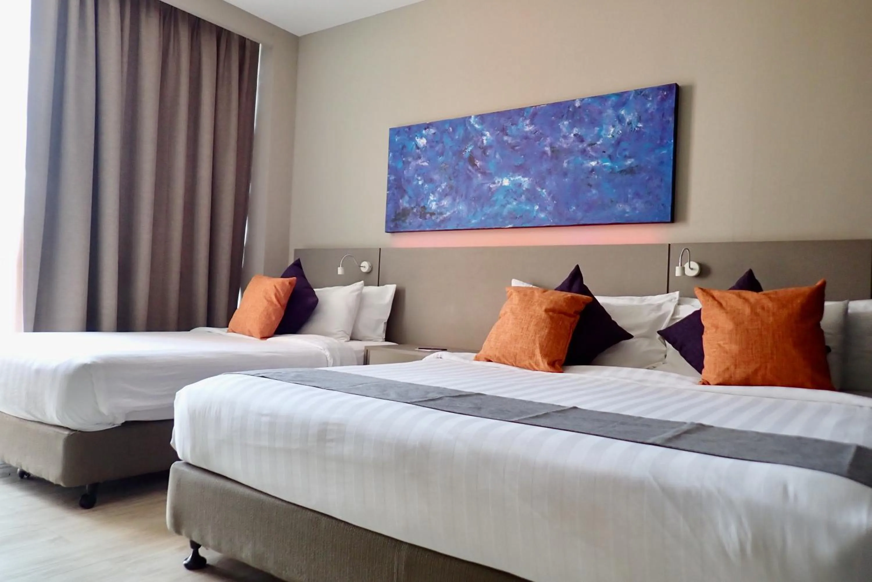 Bed in Qliq Damansara Hotel