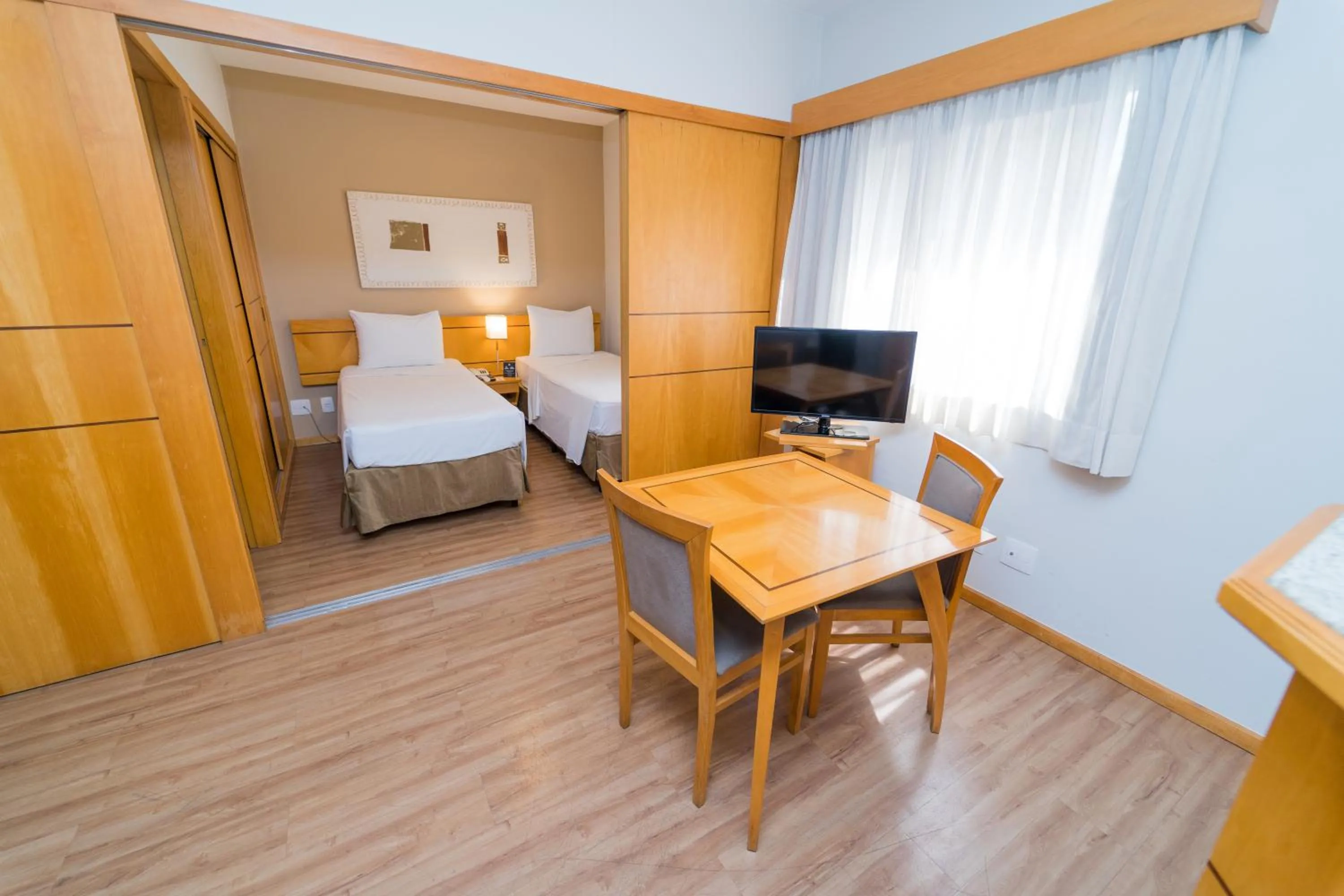 Photo of the whole room, Bed in Hampton Park São Paulo Jardins