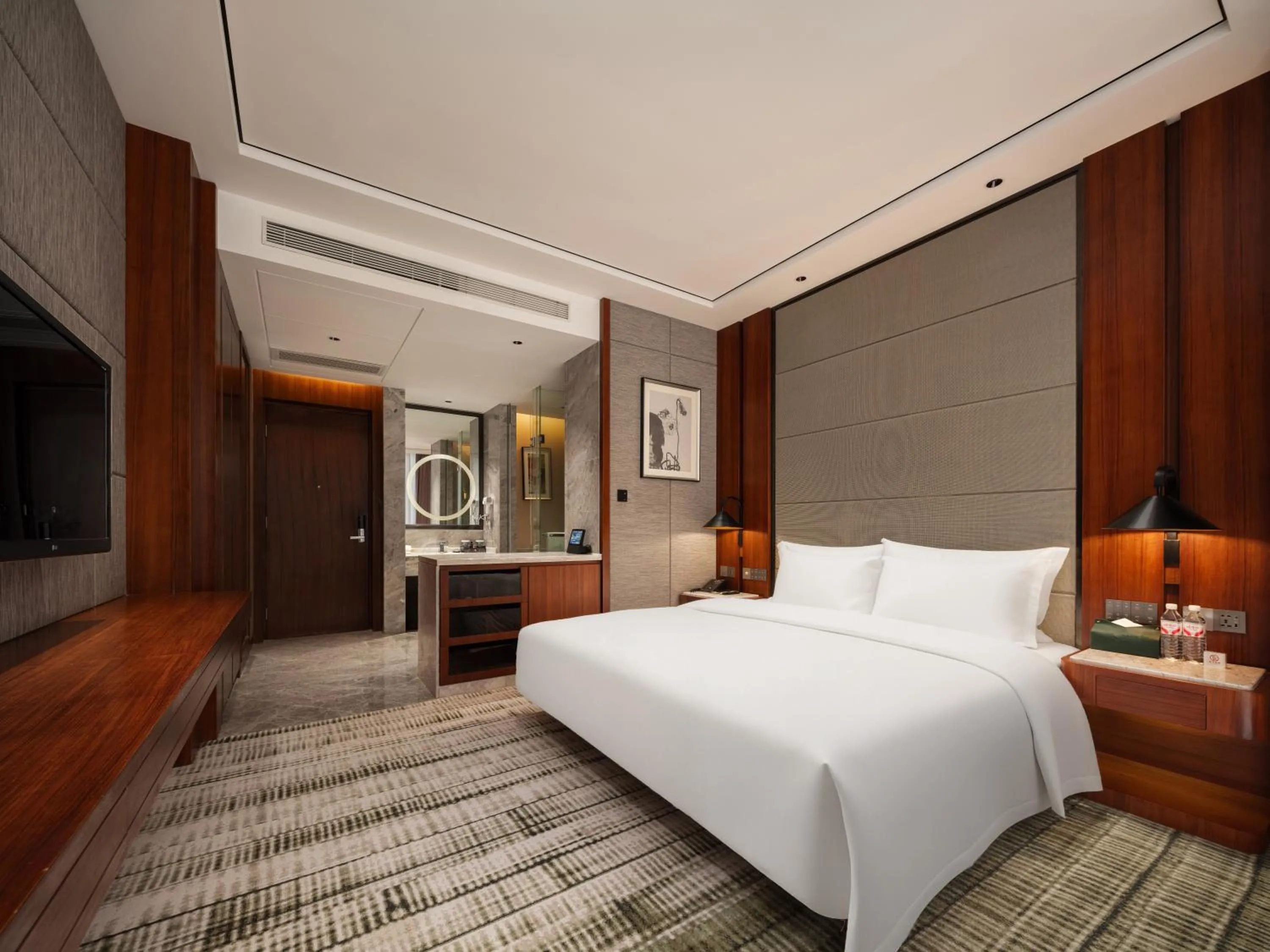 Bed in Zhuhai Palm Spring Hotel