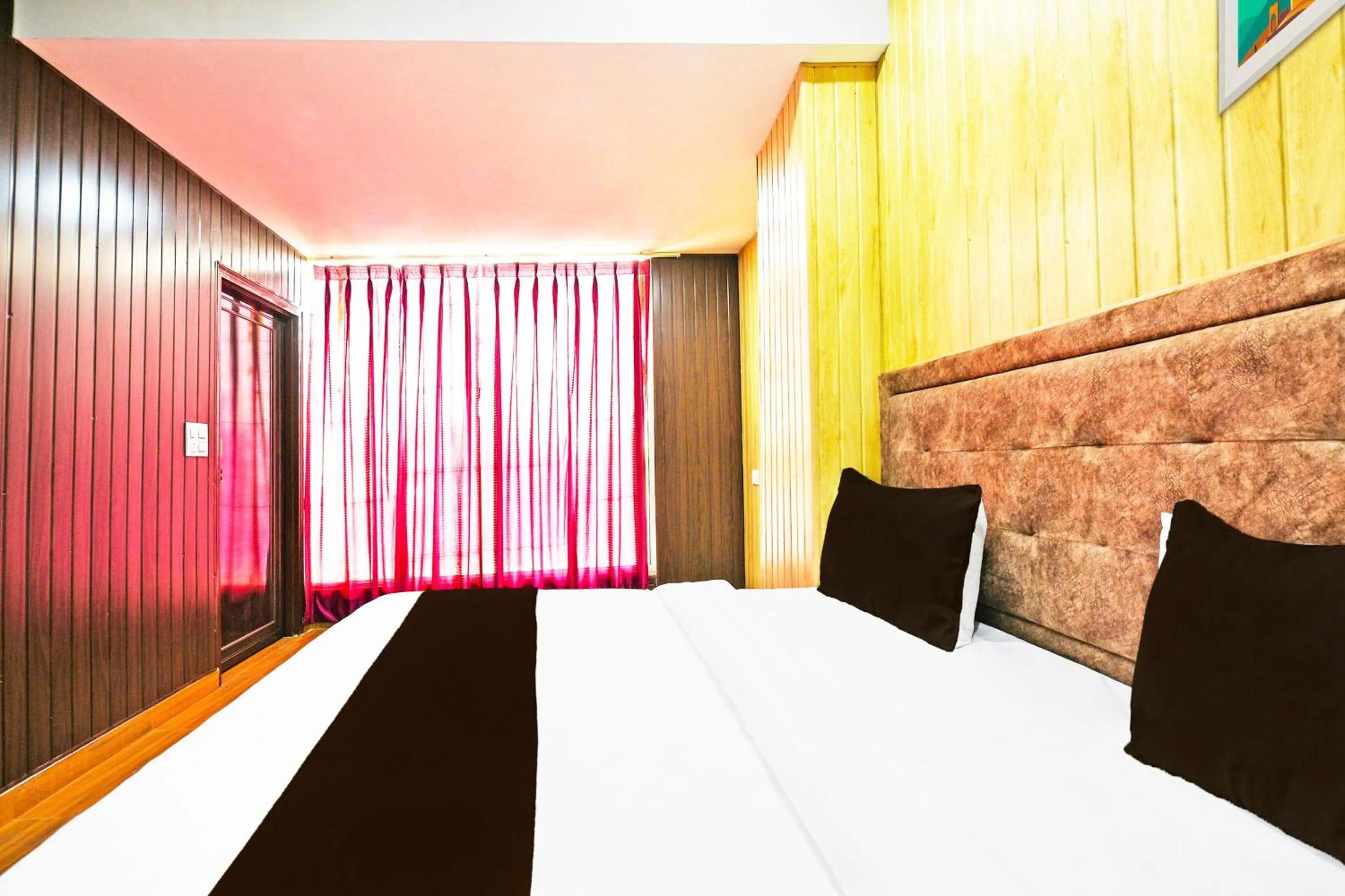Bedroom in Hotel O by OYO Lavish