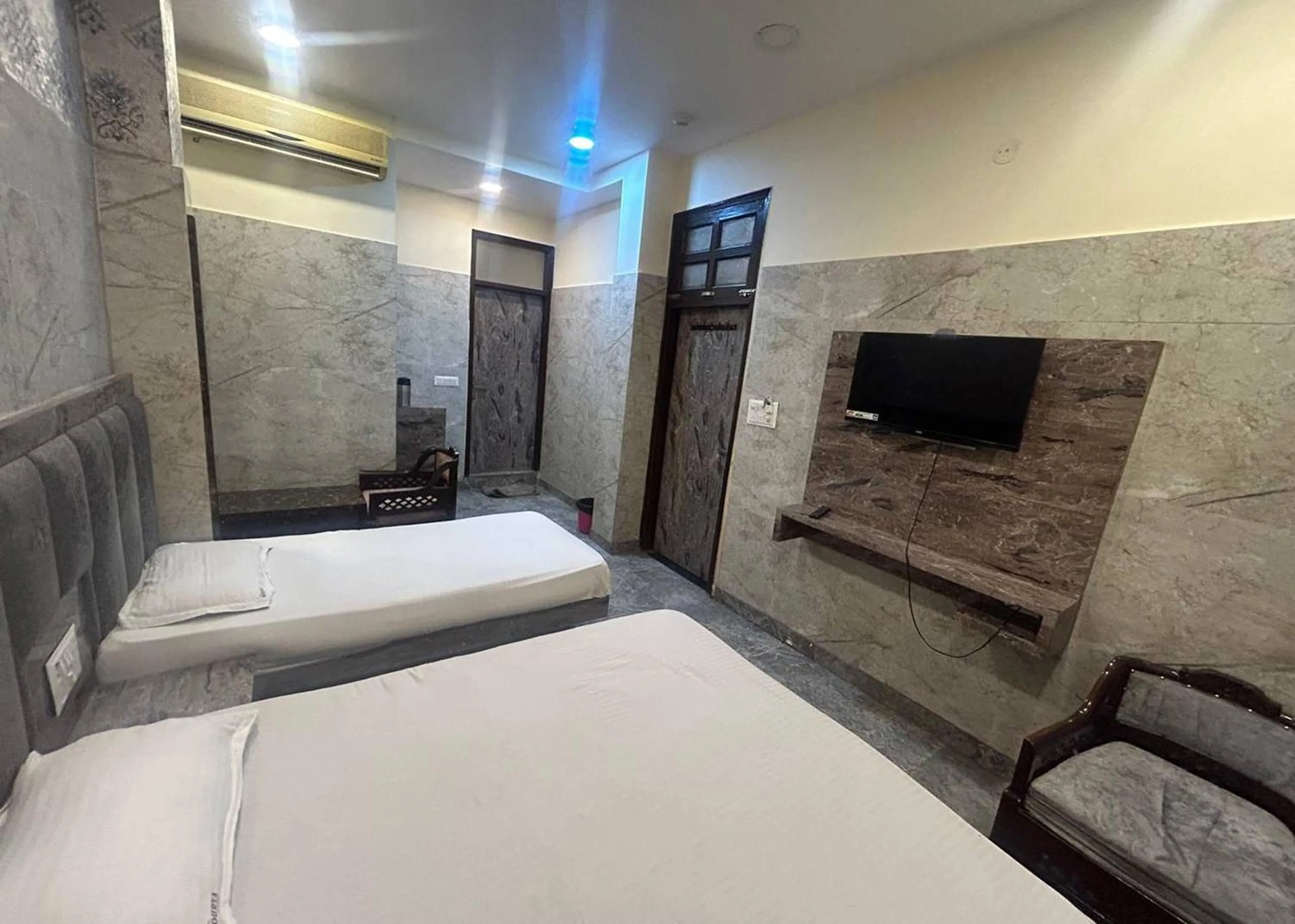 Bed in Hotel Mourya Deluxe