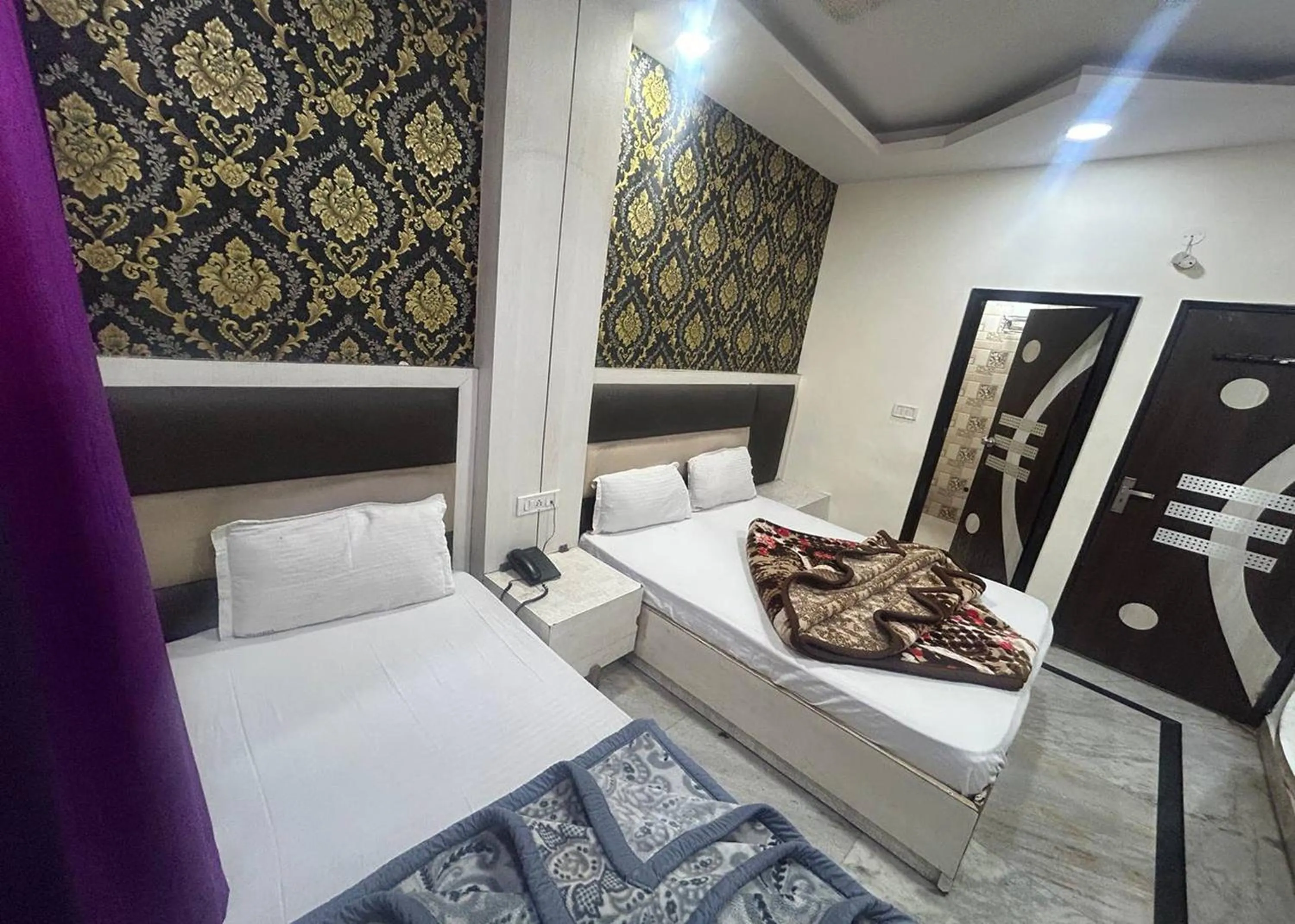 Bed in Hotel Mourya Deluxe