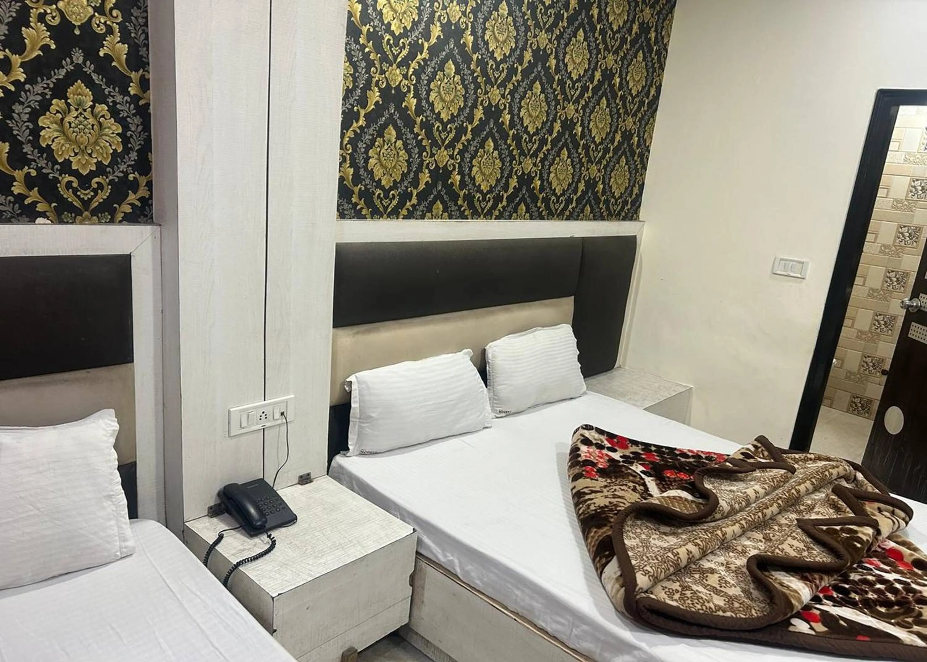 Bedroom, Bed in Hotel Mourya Deluxe