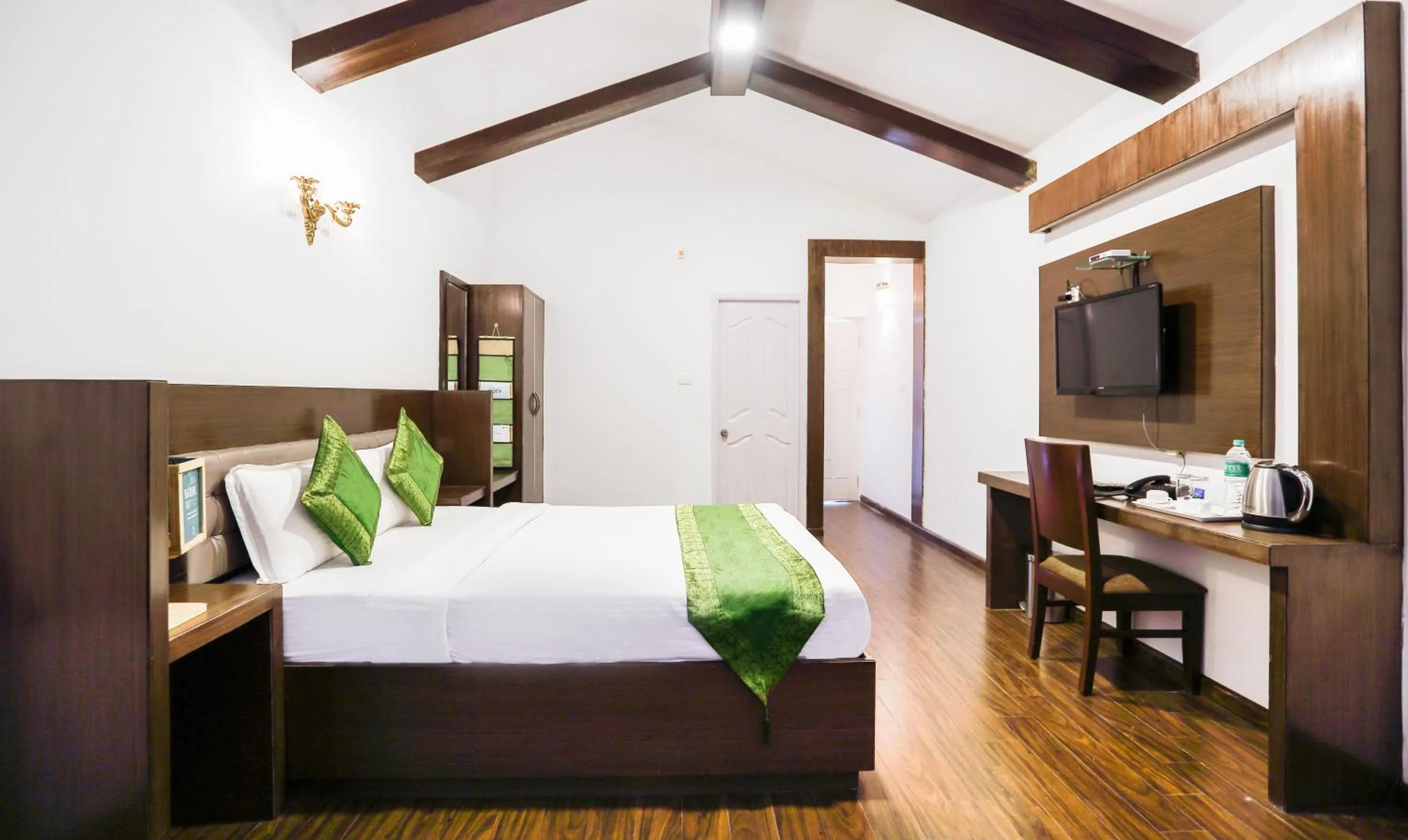 Bedroom, Bed in Treebo Skydale Inn & Suites With Mountain View