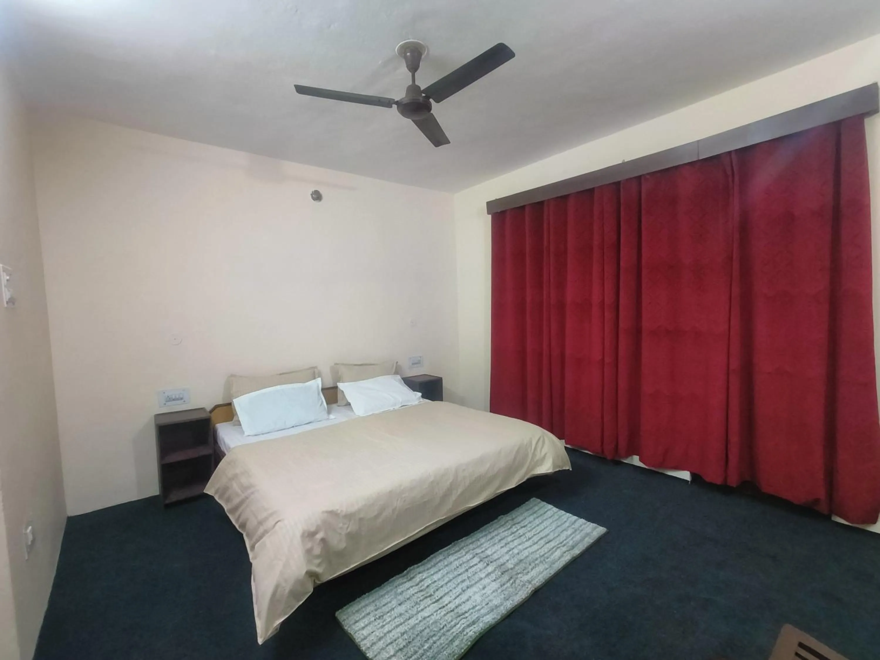 Bed in The Kailasha Homestay