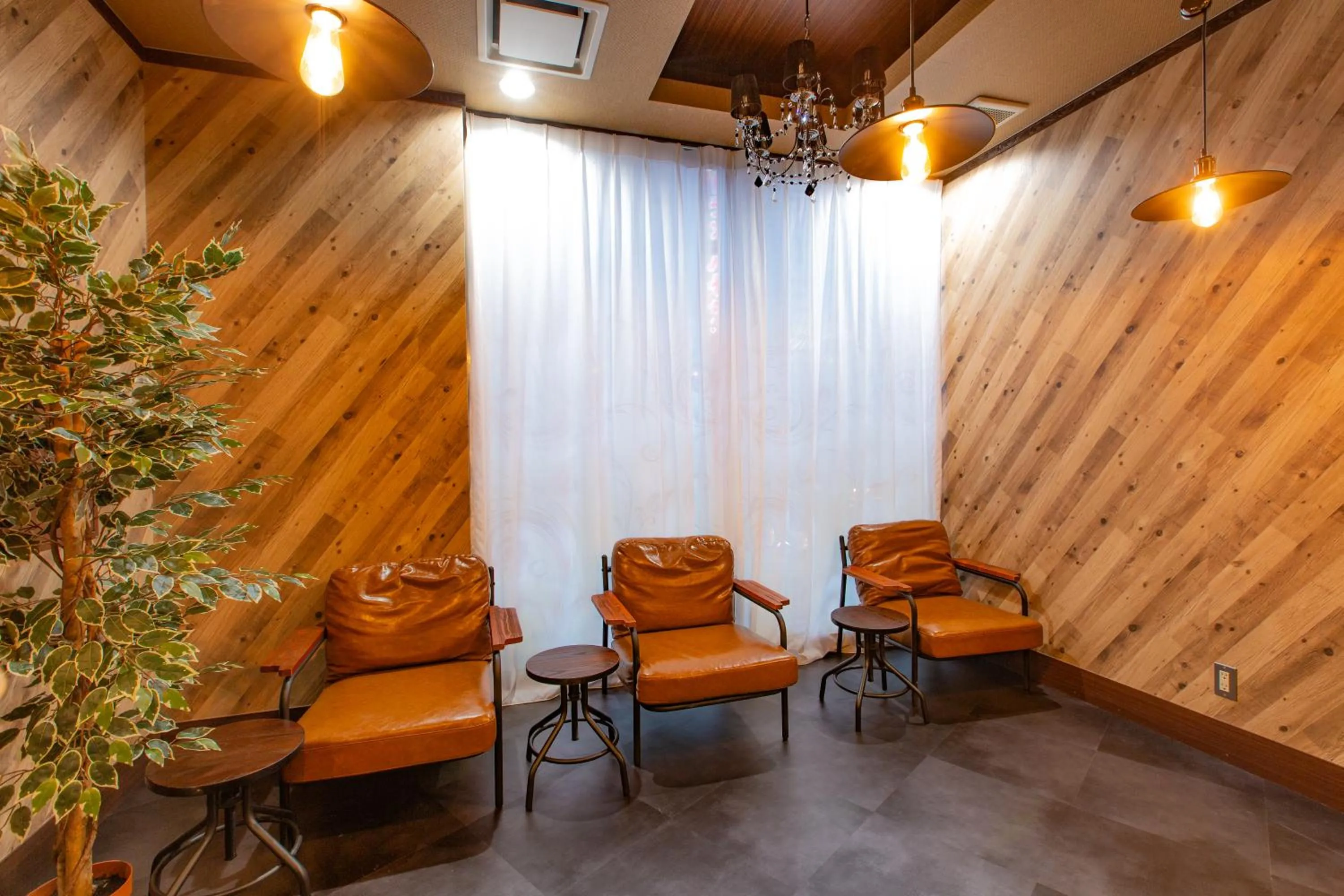 Communal lounge/ TV room in Anshin Oyado Akihabara- Men Only