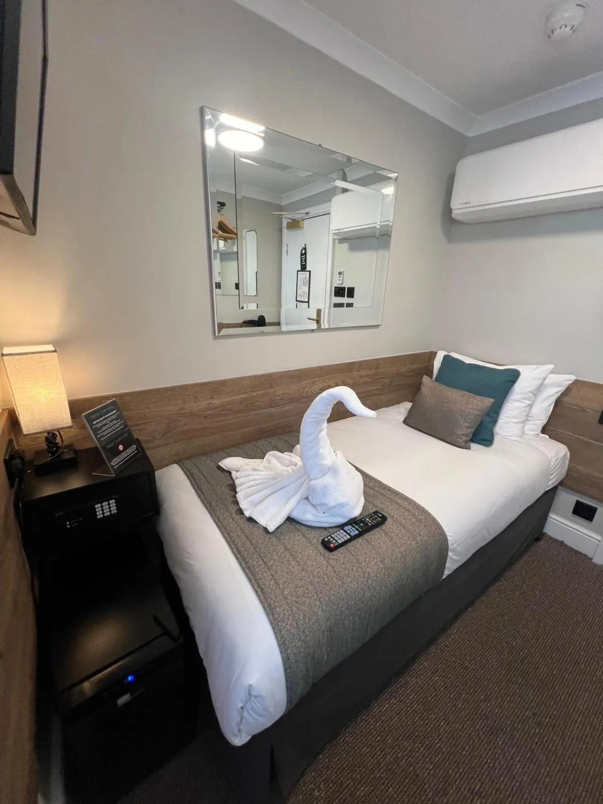 Bed in Tudor Court Hotel