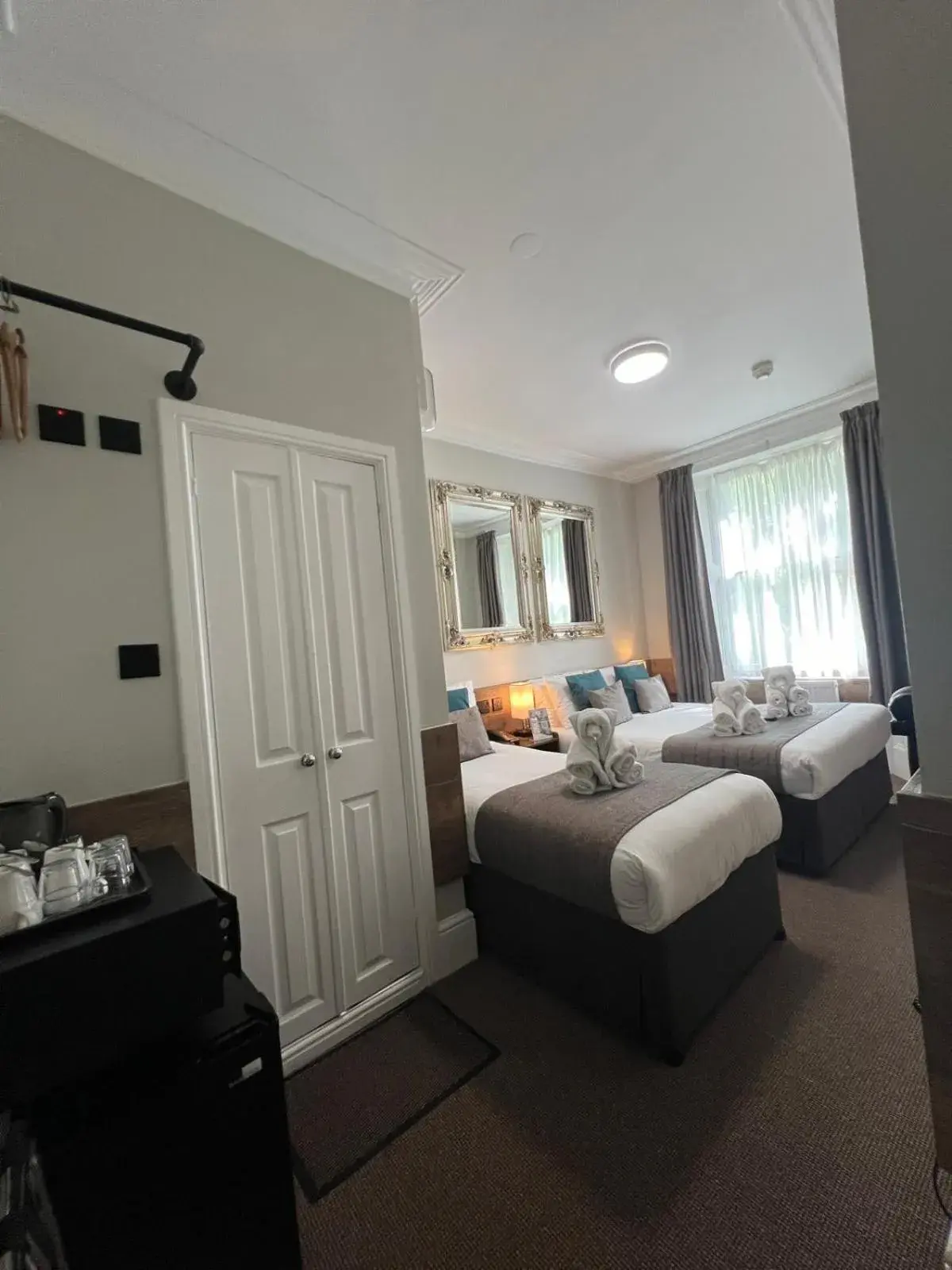 Triple Room with Garden View in Tudor Court Hotel Triple Room with Garden View in Tudor Court Hotel