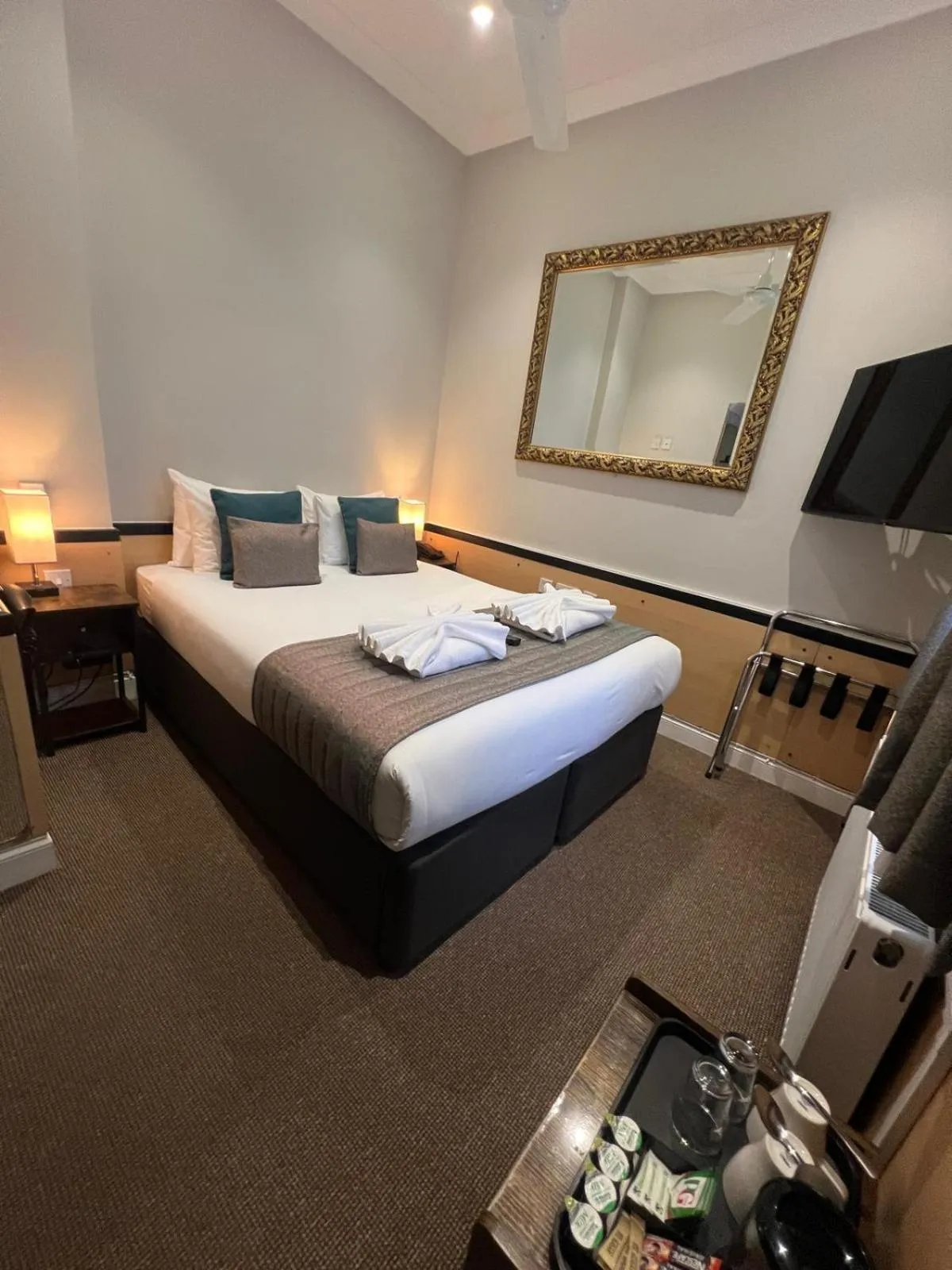 Bed in Tudor Court Hotel