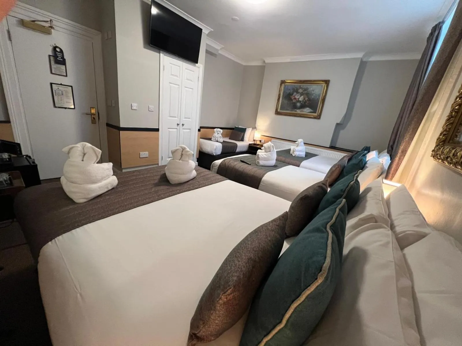 Bed in Tudor Court Hotel