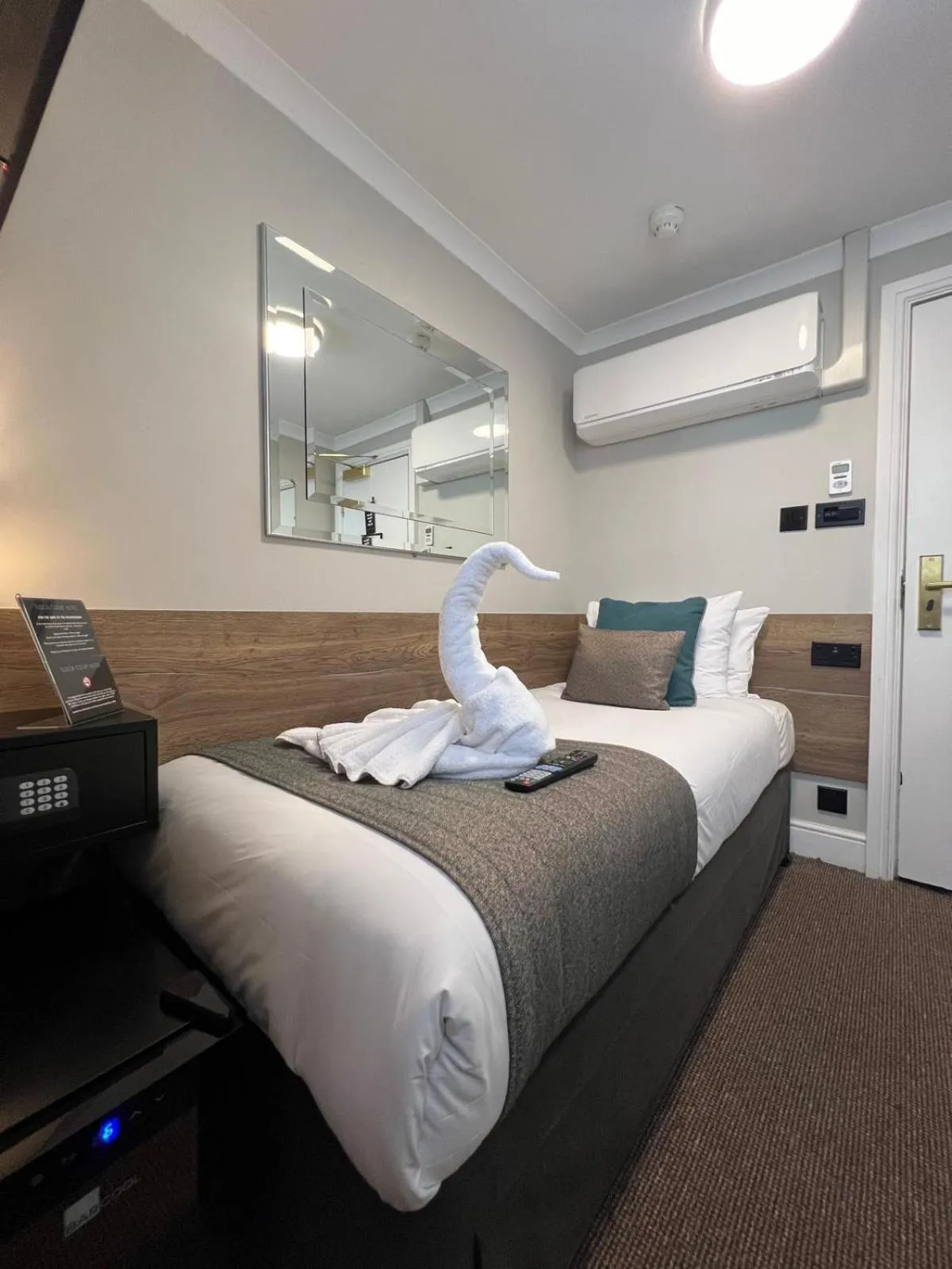 Bed in Tudor Court Hotel